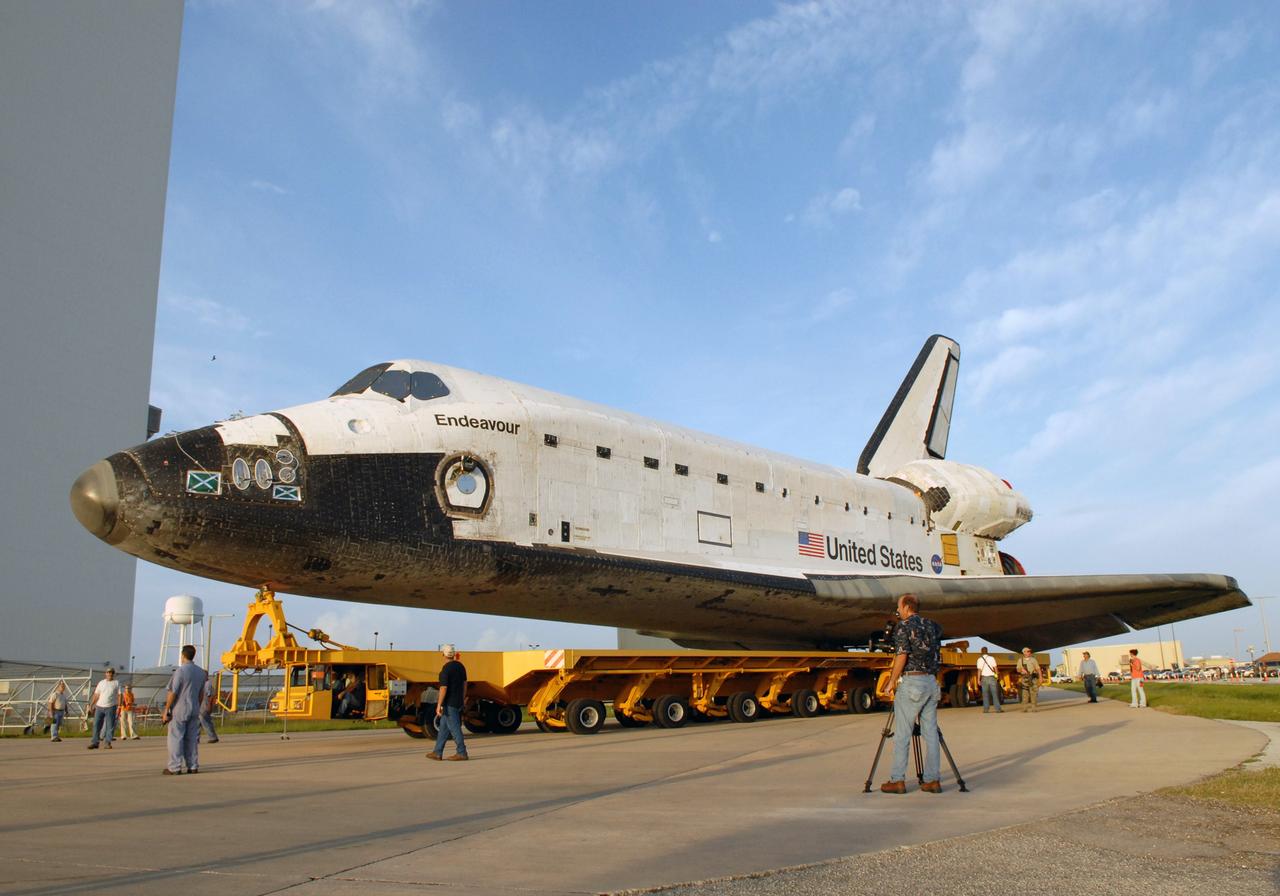 CAPE CANAVERAL, Fla. – After rolling out of Orbiter Processing Facility 2, space shuttle Endeavour begins the turn toward the Vehicle Assembly Building at NASA's Kennedy Space Center. In the VAB, Endeavour will be attached to its external fuel tank and twin solid rocket boosters. After additional preparations are made, the shuttle will be rolled out to Launch Pad 39B. Endeavour is the backup shuttle, if needed for rescue, for space shuttle Atlantis’ STS-125 mission to NASA’s Hubble Space Telescope targeted for October. Photo credit: NASA/Troy Cryder
