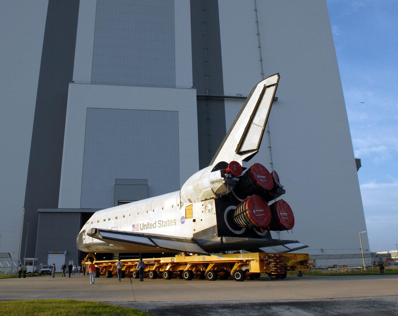 CAPE CANAVERAL, Fla. – After rolling out of Orbiter Processing Facility 2, space shuttle Endeavour turns toward the Vehicle Assembly Building at NASA's Kennedy Space Center. In the VAB, Endeavour will be attached to its external fuel tank and twin solid rocket boosters.  After additional preparations are made, the shuttle will be rolled out to Launch Pad 39B. Endeavour is the backup shuttle, if needed for rescue, for space shuttle Atlantis’ STS-125 mission to NASA’s Hubble Space Telescope targeted for October. Photo credit: NASA/Troy Cryder