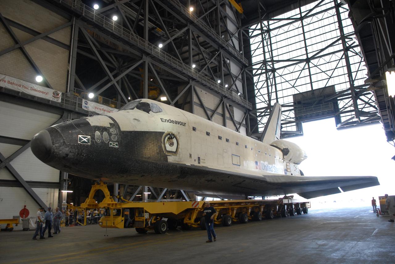 CAPE CANAVERAL, Fla. – After a short journey from Orbiter Processing Facility 2, space shuttle Endeavour arrives in the transfer aisle of the Vehicle Assembly Building at NASA's Kennedy Space Center. In the VAB, Endeavour will be attached to its external fuel tank and twin solid rocket boosters. After additional preparations are made, the shuttle will be rolled out to Launch Pad 39B. Endeavour is the backup shuttle, if needed for rescue, for space shuttle Atlantis’ STS-125 mission to NASA’s Hubble Space Telescope targeted for October. Photo credit: NASA/Troy Cryder