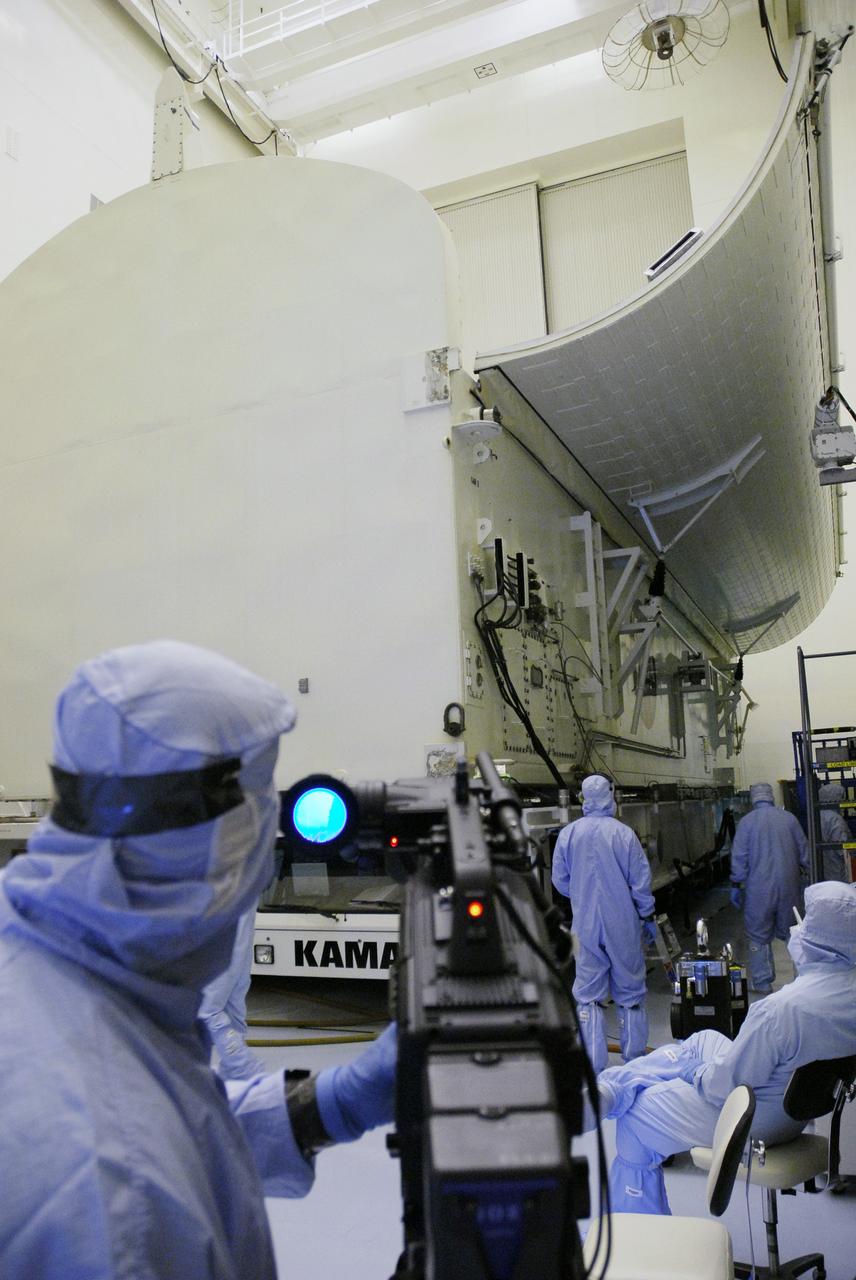 CAPE CANAVERAL, Fla. - In the Payload Hazardous Servicing Facility at NASA's Kennedy Space Center, the payload canister is moved on the floor for loading of the Super Lightweight Interchangeable Carrier, or SLIC. Contamination discovered Sept. 17 during preparations to deliver NASA's Hubble Space Telescope servicing payload to Launch Pad 39A will be removed. Cleanliness is extremely important for space shuttle Atlantis’ STS-125 mission to Hubble, and the teams have insured that the SLIC is ready to fly. The SLIC, which holds battery module assemblies for servicing of the Hubble Space Telescope on the STS-125 mission, is built with state-of-the-art, lightweight, composite materials - carbon fiber with a cyanate ester resin and a titanium metal matrix composite. These composites have greater strength-to-mass ratios than the metals typically used in spacecraft design. The carrier is one of four being transferred to Launch Pad 39A. At the pad, the carriers will be loaded into Atlantis’ payload bay. Launch of Atlantis is targeted for Oct. 10. Photo credit: NASA/Jack Pfaller