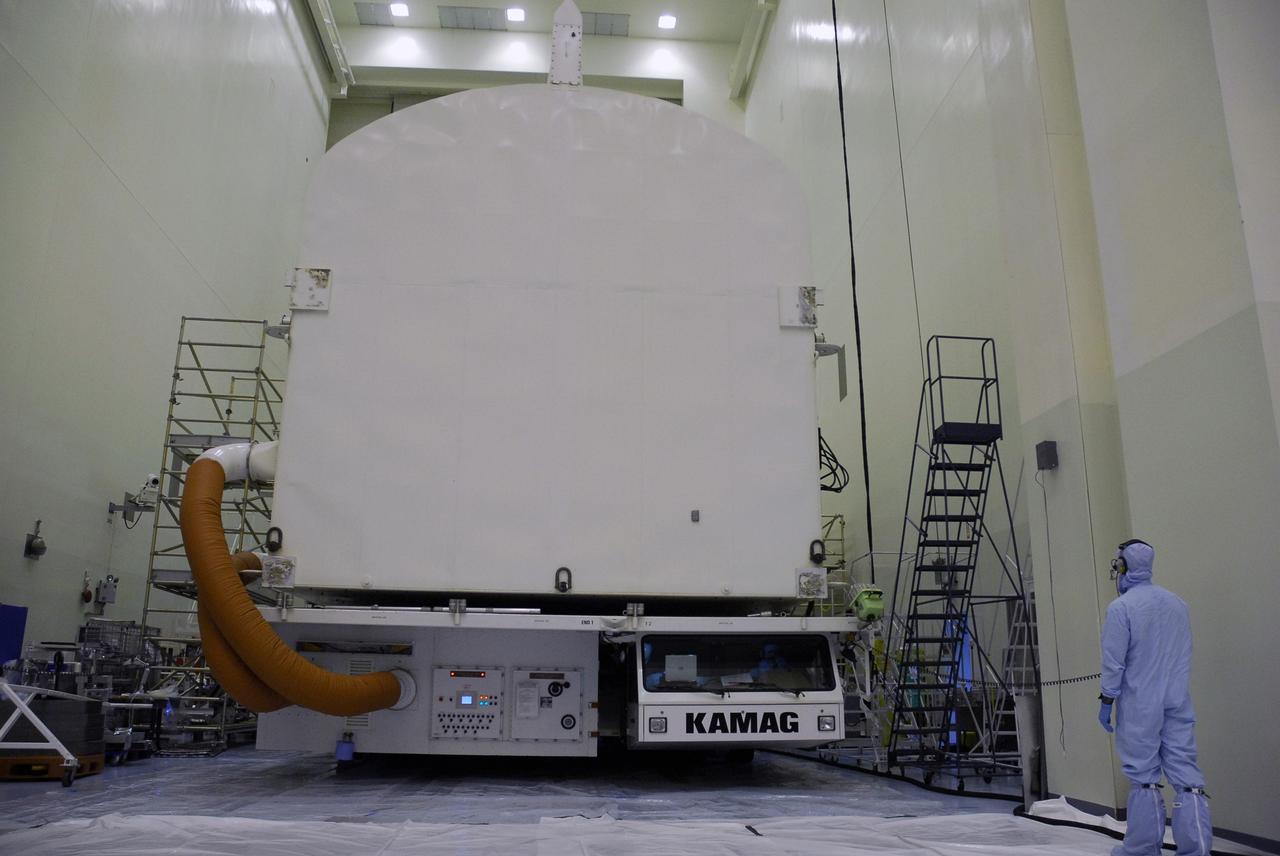 CAPE CANAVERAL, Fla. - The payload canister moves back into the environmentally controlled high bay of the Payload Hazardous Servicing Facility at NASA's Kennedy Space Center. The canister was moved out of the high bay during contamination of the Super Lightweight Integration Carrier, one of four associated with the STS-125 mission to service the Hubble Space Telescope. It will be installed in the payload canister for transfer to Launch Pad 39A. At the pad, all the carriers will be loaded into space shuttle Atlantis’ payload bay. Launch of Atlantis is targeted for Oct. 10. Photo credit: NASA/Jack Pfaller
