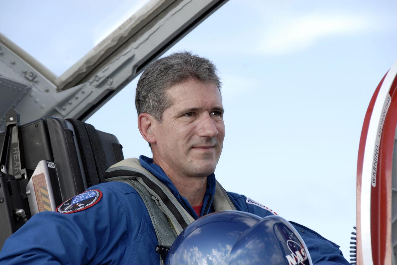 CAPE CANAVERAL, Fla. -  STS-125 mission specialist Michael Good arrives at the Shuttle Landing Facility at NASA’s Kennedy Space Center in Florida in a T-38 jet for Terminal Countdown Demonstration Test, or TCDT, activities. During TCDT, space shuttle Atlantis’ STS-125 crew members will participate in a simulated launch countdown, practice emergency egress procedures at the launch pad and continue to familiarize themselves with the mission payload and hardware. STS-125 is the fifth and final shuttle Hubble Space Telescope servicing mission. Launch is targeted for Oct. 10. Photo credit: NASA/Kim Shiflett