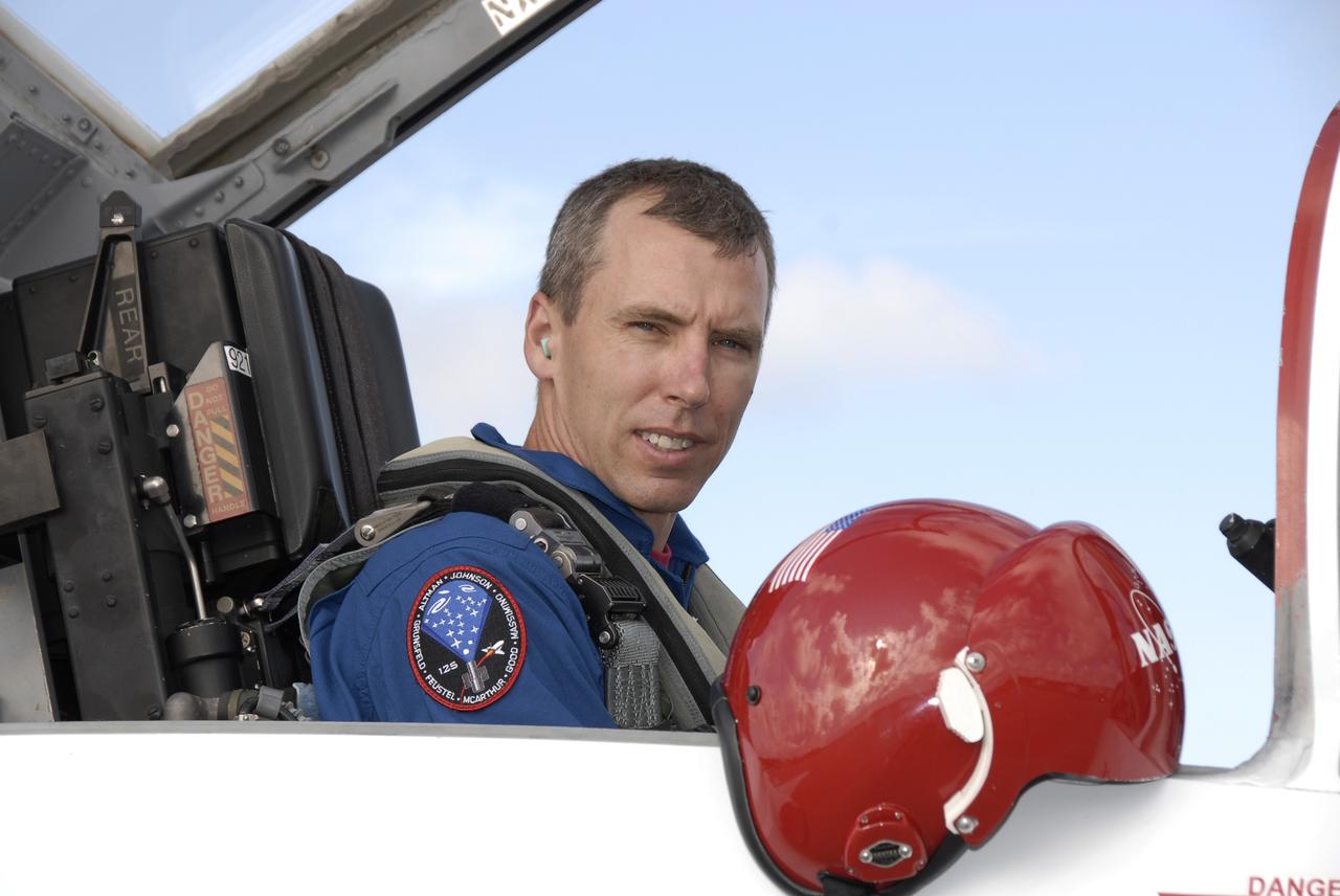 CAPE CANAVERAL, Fla. -  STS-125 mission specialist Andrew Feustel arrives at the Shuttle Landing Facility at NASA’s Kennedy Space Center in Florida in a T-38 jet for Terminal Countdown Demonstration Test, or TCDT, activities. During TCDT, space shuttle Atlantis’ STS-125 crew members will participate in a simulated launch countdown, practice emergency egress procedures at the launch pad and continue to familiarize themselves with the mission payload and hardware. STS-125 is the fifth and final shuttle Hubble Space Telescope servicing mission. Launch is targeted for Oct. 10. Photo credit: NASA/Kim Shiflett