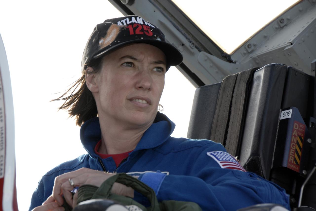 CAPE CANAVERAL, Fla. -  STS-125 mission specialist Megan McArthur arrives at the Shuttle Landing Facility at NASA’s Kennedy Space Center in Florida in a T-38 jet for Terminal Countdown Demonstration Test, or TCDT, activities. During TCDT, space shuttle Atlantis’ STS-125 crew members will participate in a simulated launch countdown, practice emergency egress procedures at the launch pad and continue to familiarize themselves with the mission payload and hardware. STS-125 is the fifth and final shuttle Hubble Space Telescope servicing mission. Launch is targeted for Oct. 10. Photo credit: NASA/Kim Shiflett