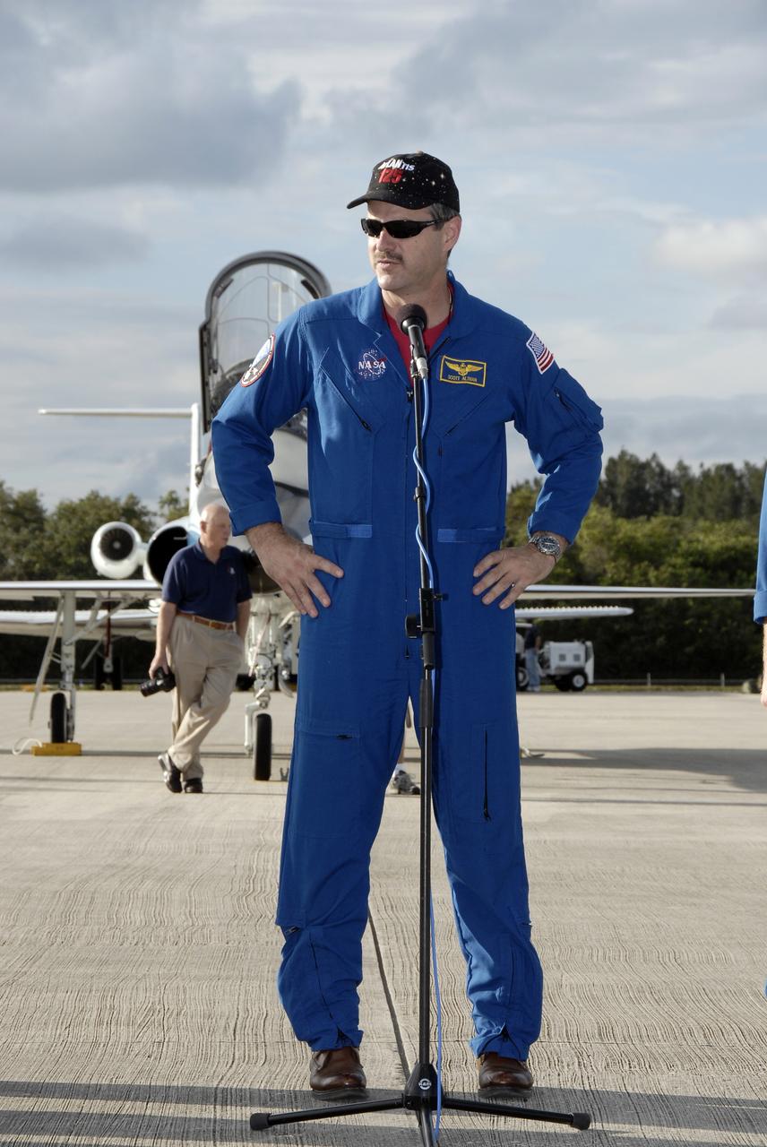 CAPE CANAVERAL, Fla. -  STS-125 commander Scott Altman speaks to the media at the Shuttle Landing Facility at NASA’s Kennedy Space Center in Florida. Altman arrived in a T-38 jet for Terminal Countdown Demonstration Test, or TCDT, activities. During TCDT, space shuttle Atlantis’ STS-125 crew members will participate in a simulated launch countdown, practice emergency egress procedures at the launch pad and continue to familiarize themselves with the mission payload and hardware. STS-125 is the fifth and final shuttle Hubble Space Telescope servicing mission. Launch is targeted for Oct. 10. Photo credit: NASA/Kim Shiflett