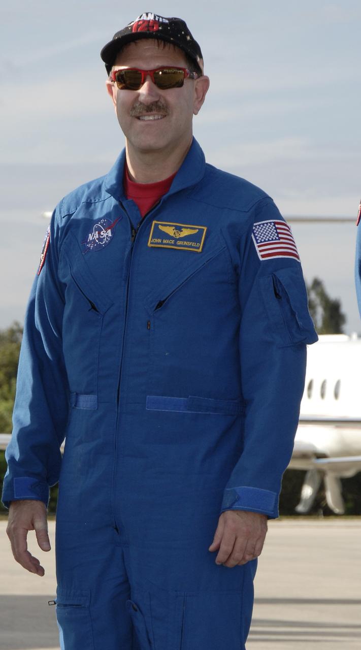 CAPE CANAVERAL, Fla. -  STS-125 mission specialist John Grunsfeld prepares to speak to the media at the Shuttle Landing Facility at NASA’s Kennedy Space Center in Florida. Grunsfeld arrived in a T-38 jet for Terminal Countdown Demonstration Test, or TCDT, activities. During TCDT, space shuttle Atlantis’ STS-125 crew members will participate in a simulated launch countdown, practice emergency egress procedures at the launch pad and continue to familiarize themselves with the mission payload and hardware. STS-125 is the fifth and final shuttle Hubble Space Telescope servicing mission. Launch is targeted for Oct. 10. Photo credit: NASA/Kim Shiflett