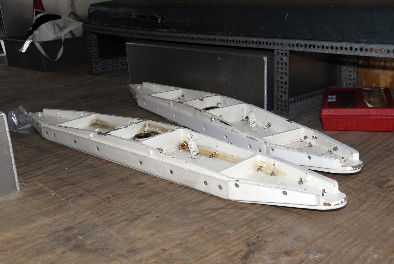 CAPE CANAVERAL, Fla. -  Technicians removed two “shoes” from the Hubble payload canister at Launch Pad 39A at NASA’s Kennedy Space Center in Florida. The canister arrived at the pad on Saturday evening; however, early Sunday morning technicians were unable to place the canister into the pad’s payload changeout room for space shuttle Atlantis’ STS-125 mission. Teflon pads on “shoes” attached to the outside of the payload canister that help the canister move along the guide rails didn’t fit properly. The shoes were removed and several options were considered, including slightly shaving down the pads so the shoes will fit onto the rails.  STS-125 is the fifth and final shuttle Hubble Space Telescope servicing mission. Atlantis’ launch is targeted for Oct. 10. Photo credit: NASA/Kim Shiflett.