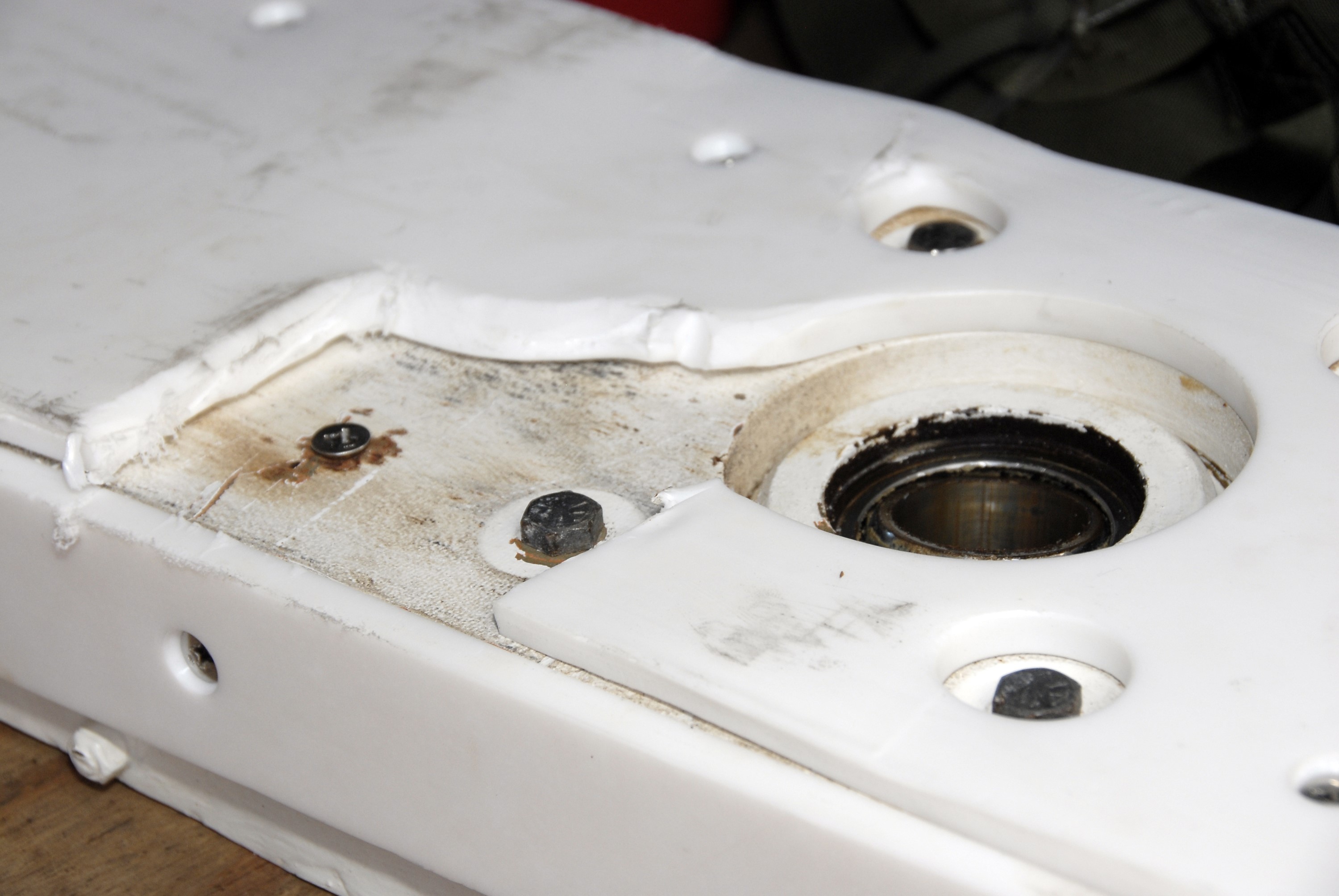 CAPE CANAVERAL, Fla. -  A close up view of one of the “shoes” removed from the Hubble payload canister at Launch Pad 39A at NASA’s Kennedy Space Center in Florida. The canister arrived at the pad on Saturday evening; however, early Sunday morning technicians were unable to place the canister into the pad’s payload changeout room for space shuttle Atlantis’ STS-125 mission. Teflon pads on “shoes” attached to the outside of the payload canister that help the canister move along the guide rails didn’t fit properly. The shoes were removed and several options were considered, including slightly shaving down the pads so the shoes will fit onto the rails. STS-125 is the fifth and final shuttle Hubble Space Telescope servicing mission. Atlantis’ launch is targeted for Oct. 10. Photo credit: NASA/Kim Shiflett.