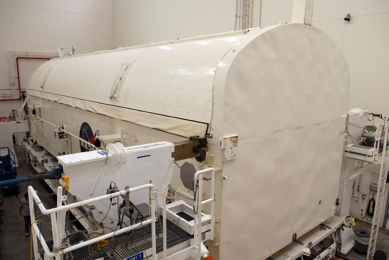 CAPE CANAVERAL, Fla. -  At NASA's Kennedy Space Center, the payload canister is in the Canister Rotation Facility where it will be lifted to a vertical position.  The canister transporter will then carry the canister and its cargo to Launch Pad 39A.  The cargo consists of four carriers holding various equipment for the STS-125 mission aboard space shuttle Atlantis to service NASA’s Hubble Space Telescope.  At the pad, the cargo will be moved into the Payload Changeout Room.  The changeout room is the enclosed, environmentally controlled portion of the rotating service structure that supports cargo delivery to the pad and subsequent vertical installation into the shuttle’s payload bay. Launch of Atlantis is targeted for Oct. 10.   Photo credit: NASA/Jack Pfaller