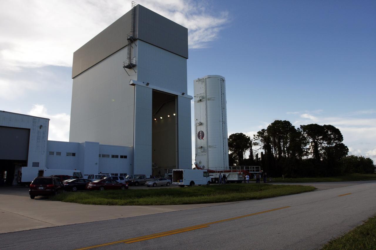 CAPE CANAVERAL, Fla. -  The payload canister moves out of the Canister Rotation Facility at NASA's Kennedy Space Center in Florida heading for Launch Pad 39A.  It carries a cargo of four carriers holding various equipment for the STS-125 mission aboard space shuttle Atlantis to service NASA’s Hubble Space Telescope.   At the pad, the cargo will be moved into the Payload Changeout Room.  The changeout room is the enclosed, environmentally controlled portion of the rotating service structure that supports cargo delivery to the pad and subsequent vertical installation into the shuttle’s payload bay. Launch of Atlantis is targeted for Oct. 10.  Photo credit: NASA/Troy Cryder