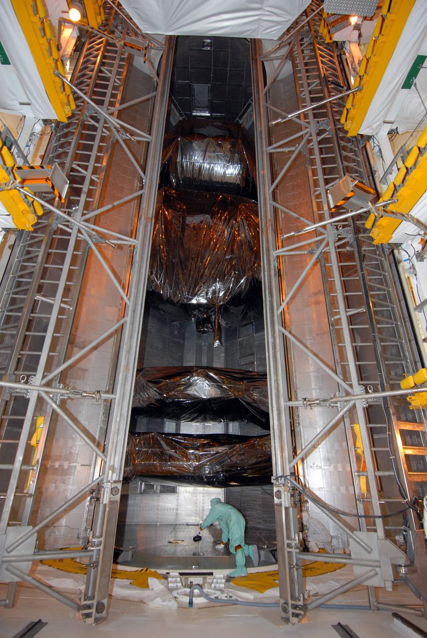 CAPE CANAVERAL, Fla. -   Inside the payload changeout room, or PCR, at NASA's Kennedy Space Center Launch Pad 39A, the doors of the payload canister are open.  Inside are four carriers holding various equipment for the STS-125 mission aboard space shuttle Atlantis to service NASA’s Hubble Space Telescope. The PCR is the enclosed, environmentally controlled portion of the rotating service structure that supports cargo delivery to the pad and subsequent vertical installation into the shuttle’s payload bay. Launch of Atlantis is targeted for Oct. 10. Photo credit: NASA/Jack Pfaller