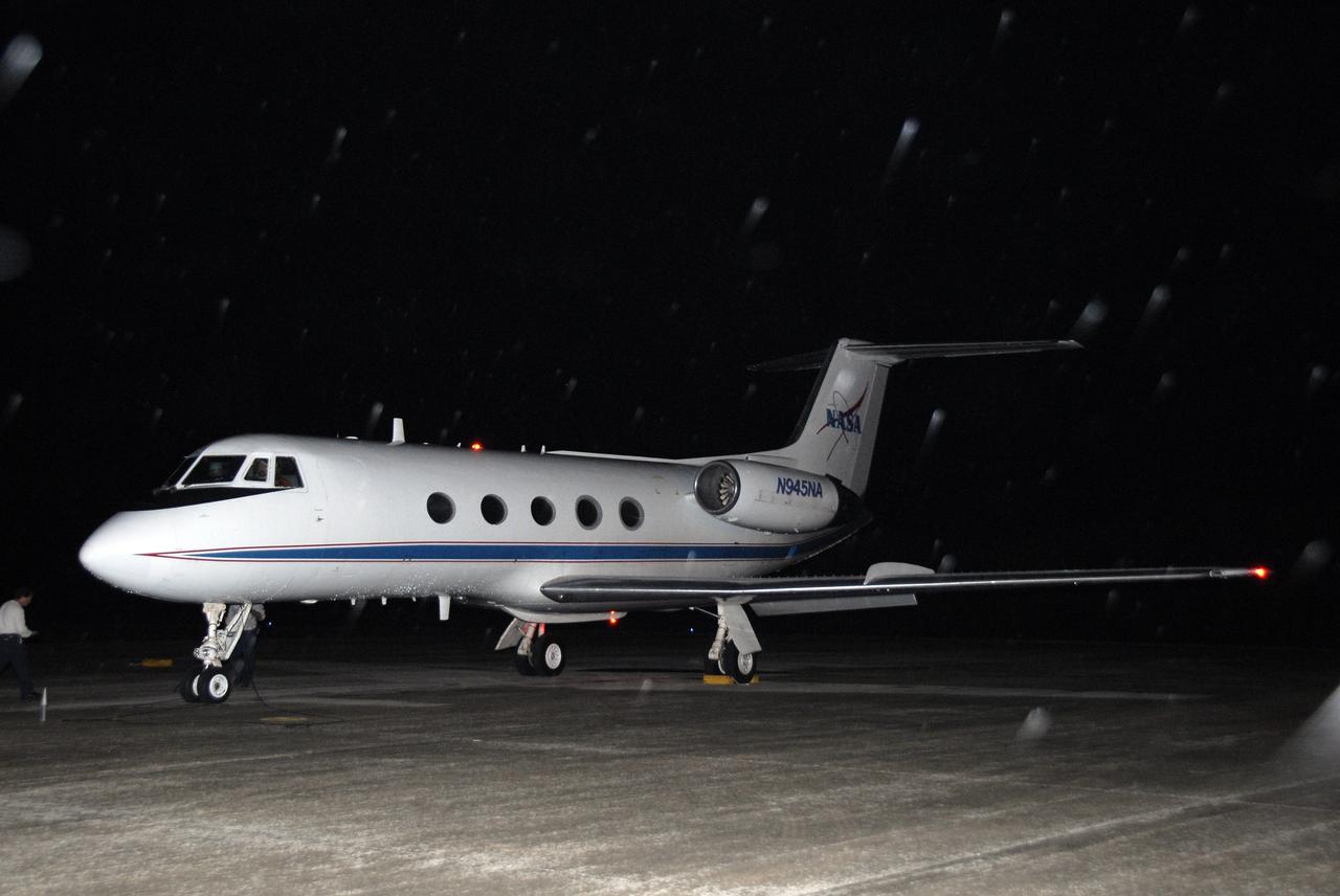 CAPE CANAVERAL, Fla. -   At the Shuttle Landing Facility at NASA's Kennedy Space Center in Florida, the shuttle training aircraft piloted by STS-125 Commander Scott Altman is ready to taxi to the runway for practice shuttle landings. The STA is a Grumman American Aviation-built Gulf Stream II jet that was modified to simulate a shuttle’s cockpit, motion and visual cues, and handling qualities. In flight, the aircraft duplicates the shuttle’s atmospheric descent trajectory from approximately 35,000 feet altitude to landing on a runway. The practice is part of a terminal countdown demonstration test, or TCDT, to prepare for launch.  TCDT provides astronauts and ground crews with an opportunity to participate in various simulated countdown activities, including equipment familiarization, emergency training and a simulated launch countdown. Space shuttle Atlantis’ STS-125 mission to service NASA’s Hubble Space Telescope is targeted to launch Oct. 10.  Photo credit: NASA/Kim Shiflett