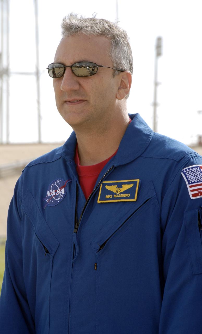 CAPE CANAVERAL, Fla. - On Launch Pad 39A at NASA's Kennedy Space Center in Florida, STS-125 Mission Specialist Mike Massimino discusses his role in the mission for the media. The crew is at Kennedy to take part in terminal countdown demonstration test, or TCDT, activities before launching on space shuttle Atlantis’ mission to service NASA’s Hubble Space Telescope. TCDT provides astronauts and ground crews with an opportunity to participate in various simulated countdown activities, including equipment familiarization, emergency training and a simulated launch countdown. Atlantis is targeted to launch Oct. 10. Photo credit: NASA/Kim Shiflett
