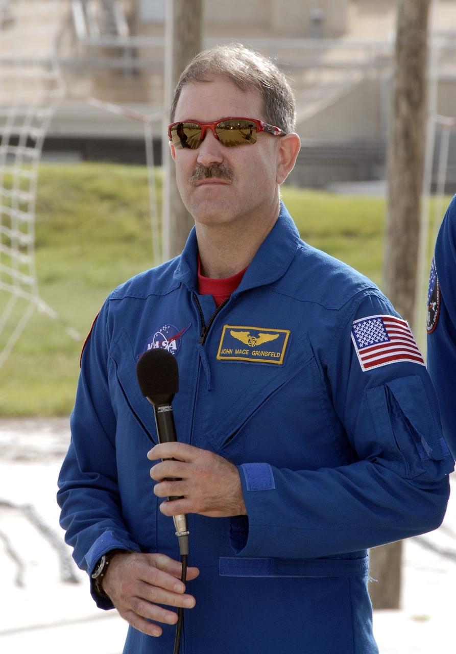 CAPE CANAVERAL, Fla. - On Launch Pad 39A at NASA's Kennedy Space Center in Florida, STS-125 Mission Specialist John Grunsfeld discusses his role in the mission for the media. The crew is at Kennedy to take part in terminal countdown demonstration test, or TCDT, activities before launching on space shuttle Atlantis’ mission to service NASA’s Hubble Space Telescope. TCDT provides astronauts and ground crews with an opportunity to participate in various simulated countdown activities, including equipment familiarization, emergency training and a simulated launch countdown. Atlantis is targeted to launch Oct. 10. Photo credit: NASA/Kim Shiflett