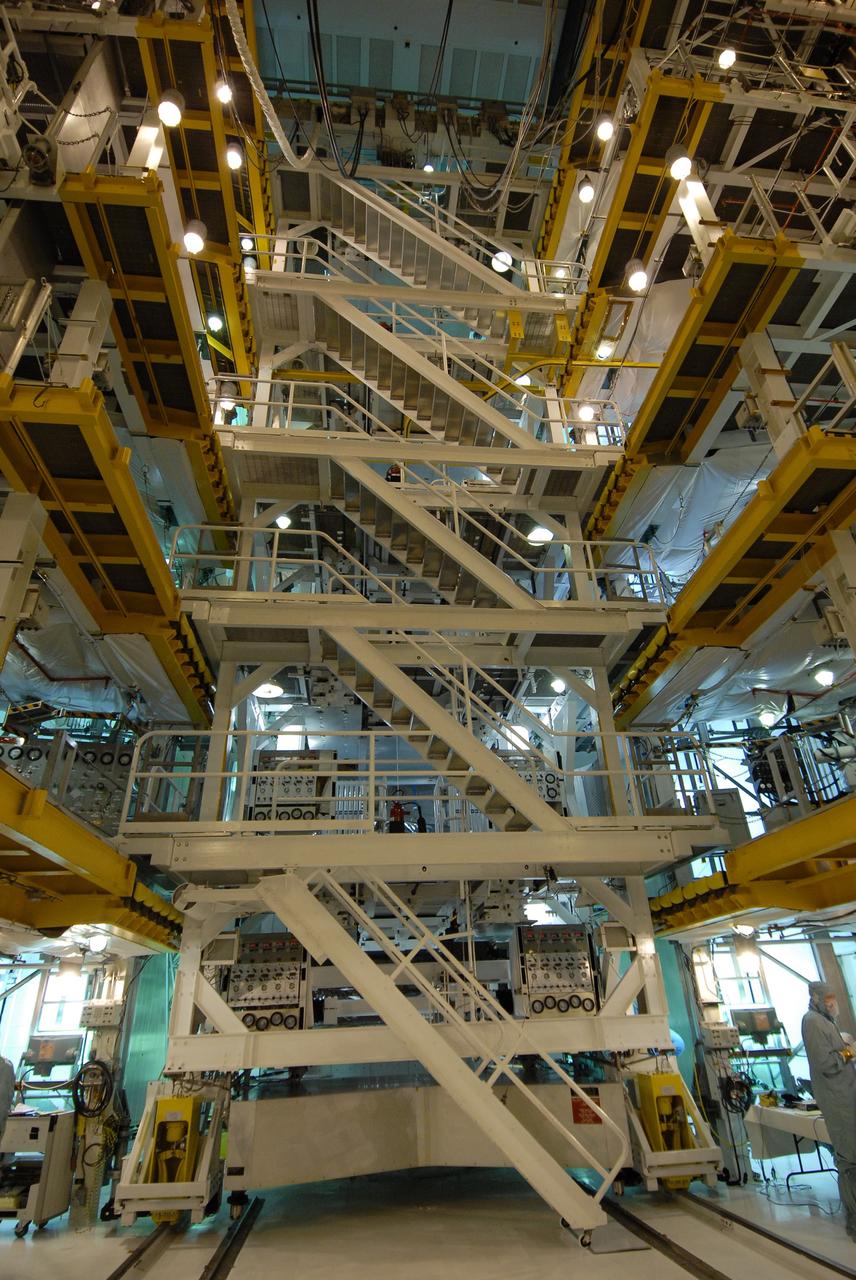 CAPE CANAVERAL, Fla. -   In At NASA's Kennedy Space Center in Florida, the payload ground handling mechanism in the Payload Changeout Room on Launch Pad 39A is viewed from the rear as it transfers the STS-125 mission payload into space shuttle Atlantis’ payload bay.  STS-125 is the fifth and final shuttle servicing mission for NASA’s Hubble Space Telescope.  The payload comprises four carriers holding various equipment for the mission. Atlantis is targeted to launch Oct. 14 on the 11-day mission.  Photo credit: NASA/Jack Pfaller