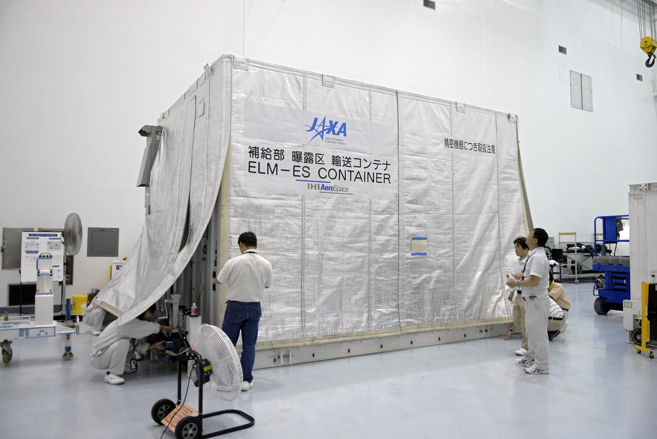 CAPE CANAVERAL, Fla. -   The Kibo Experiment Logistics Module Exposed Section, or ELM-ES, shipping container is uncovered in the Space Station Processing Facility at NASA's Kennedy Space Center in Florida.  The ELM-ES is one of the final components of the Japan Aerospace Exploration Agency's Kibo laboratory for the International Space Station.  It can provide payload storage space and can carry up to three payloads at launch. In addition, the ELM-ES provides a logistics function where it can be returned to the ground aboard the space shuttle. The ELM-ES will be carried aboard space shuttle Endeavour on the STS-127 mission targeted for launch May 15, 2009. Photo credit: NASA/Kim Shiflett