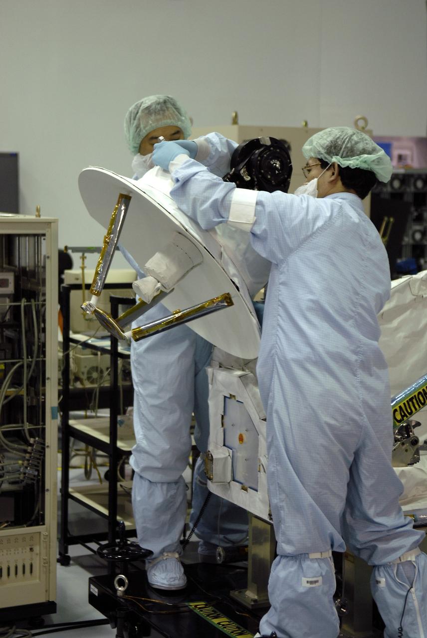 CAPE CANAVERAL, Fla. - In the Space Station Processing Facility at NASA's Kennedy Space Center in Florida, Japanese Aerospace Exploration Agency, or JAXA, technicians test the deployment of an antenna from the Inter Orbit Communication System Extended Facility, or ICS-EF. The antenna and a pointing mechanism will be used to communicate with JAXA’s Data Relay Test Satellite, or DRTS. The ICS-EF will be launched, along with the Extended Facility and Experiment Logistics Module-Exposed Section, to the International Space Station aboard the space shuttle Endeavour on the STS-127mission targeted for launch on May 15, 2009. Photo credit: NASA/Kim Shiflett