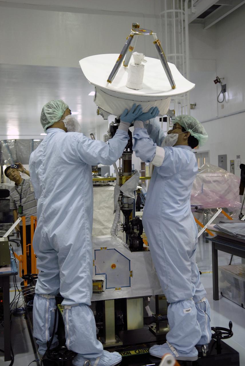 CAPE CANAVERAL, Fla. - In the Space Station Processing Facility at NASA's Kennedy Space Center in Florida, Japanese Aerospace Exploration Agency, or JAXA, technicians test the deployment of an antenna and boom from the Inter Orbit Communication System Extended Facility, or ICS-EF. The antenna and a pointing mechanism will be used to communicate with JAXA’s Data Relay Test Satellite, or DRTS. The ICS-EF will be launched, along with the Extended Facility and Experiment Logistics Module-Exposed Section, to the International Space Station aboard the space shuttle Endeavour on the STS-127mission targeted for launch on May 15, 2009. Photo credit: NASA/Kim Shiflett