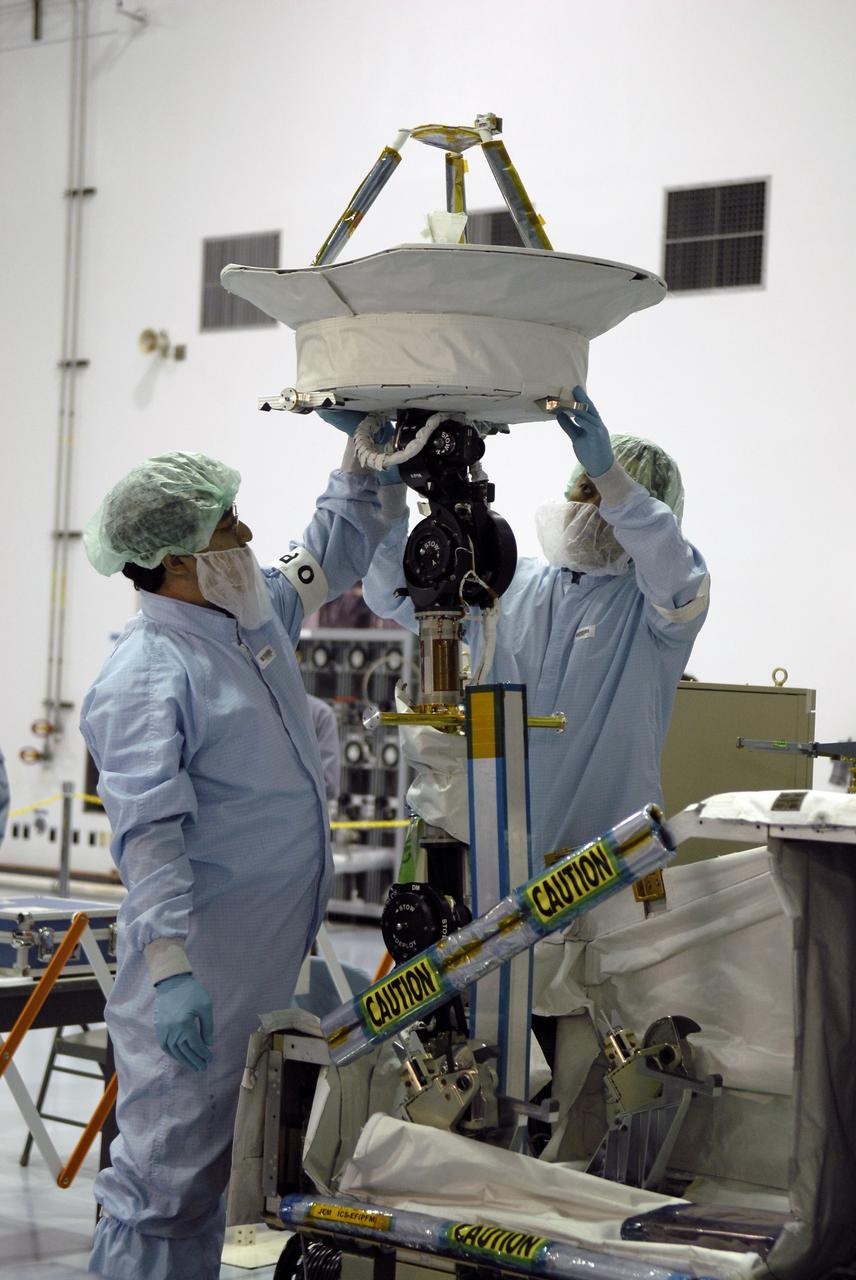 CAPE CANAVERAL, Fla. - In the Space Station Processing Facility at NASA's Kennedy Space Center in Florida, Japanese Aerospace Exploration Agency, or JAXA, technicians test the deployment of an antenna and boom from the Inter Orbit Communication System Extended Facility, or ICS-EF. The antenna and a pointing mechanism will be used to communicate with JAXA’s Data Relay Test Satellite, or DRTS. The ICS-EF will be launched, along with the Extended Facility and Experiment Logistics Module-Exposed Section, to the International Space Station aboard the space shuttle Endeavour on the STS-127mission targeted for launch on May 15, 2009. Photo credit: NASA/Kim Shiflett
