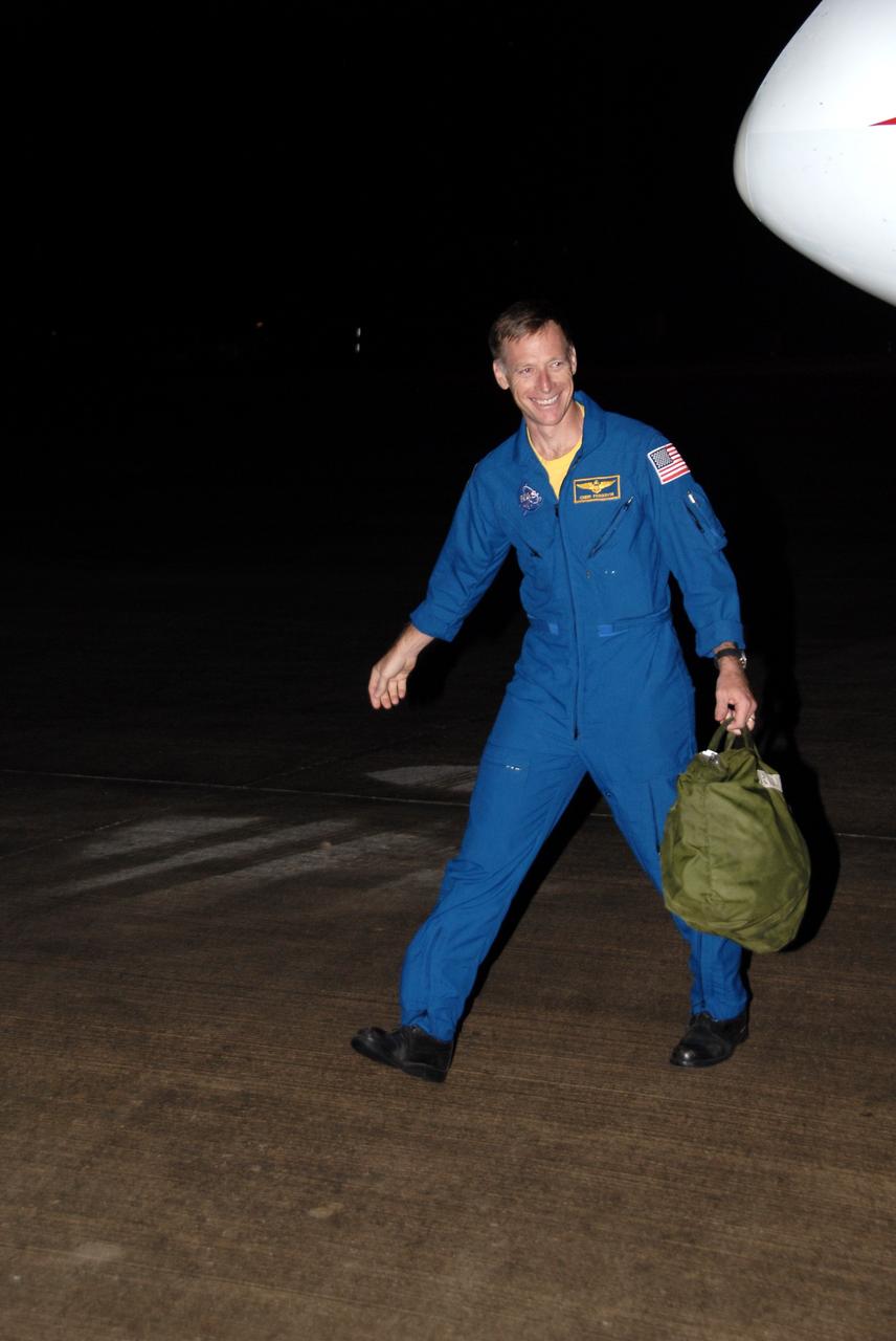 CAPE CANAVERAL, Fla. -  On the Shuttle Landing Facility at NASA's Kennedy Space Center in Florida, space shuttle Endeavour’s STS-126 commander, Chris Ferguson, walks away from the Shuttle Training Aircraft, or STA. Ferguson flew the STA to practice landing the shuttle on the runway. The STA is a Grumman American Aviation-built Gulf Stream II jet that was modified to simulate a shuttle’s cockpit, motion and visual cues, and handling qualities. In flight, the aircraft duplicates the shuttle’s atmospheric descent trajectory from approximately 35,000 feet altitude to landing on a runway. Ferguson previously served as pilot on the STS-115 mission, which flew in September 2006.  The STS-126 mission to the International Space Station is targeted to launch Nov. 16.  Photo credit: NASA/Cory Huston