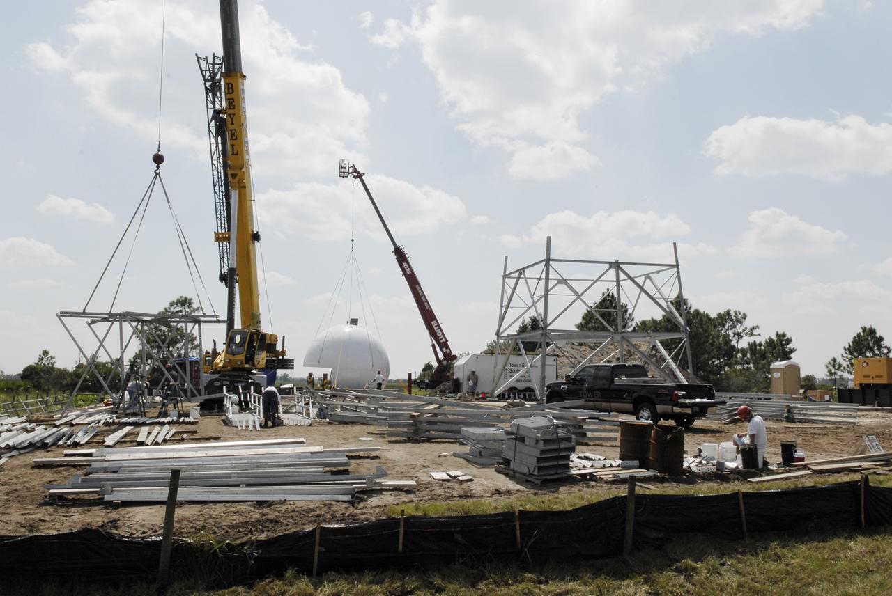 CAPE CANAVERAL, Fla. - A new Doppler weather radar tower is being built in an area near S.R. 520 in Orange County, Florida. The new tower will replace one at nearby Patrick Air Force Base. The site will be used by NASA's Kennedy Space Center, the 45th Space Wing and their customers. The tower will be able to monitor weather conditions directly above the launch pads at Kennedy. The weather radar is essential in issuing lightning and other severe weather warnings and vital in evaluating lightning launch commit criteria. The new radar, replacing what was installed 25 years ago, includes Doppler capability to detect winds and identify the type, size and number of precipitation particles. The site is ideally distant from the launch pads and has unobstructed views of Cape Canaveral Air Force Station and Kennedy. Photo credit: NASA/Kim Shiflett
