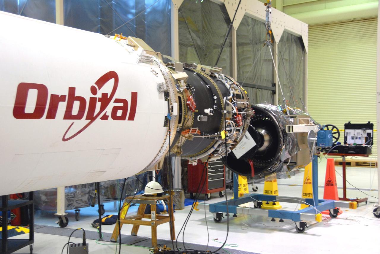 Vandenberg Air Force Base, Calif. – At Vandenberg Air Force Base, the Pegasus XL aircraft (left) is ready for mating to NASA's Interstellar Boundary Explorer, or IBEX, spacecraft and upper stage booster (right). The IBEX satellite will make the first map of the boundary between the Solar System and interstellar space. IBEX is the first mission designed to detect the edge of the Solar System. IBEX is targeted for launch from the Kwajalein Atoll, a part of the Marshall Islands in the Pacific Ocean, on Oct. 19. Photo credit: NASA/D. Kolkow, VAFB