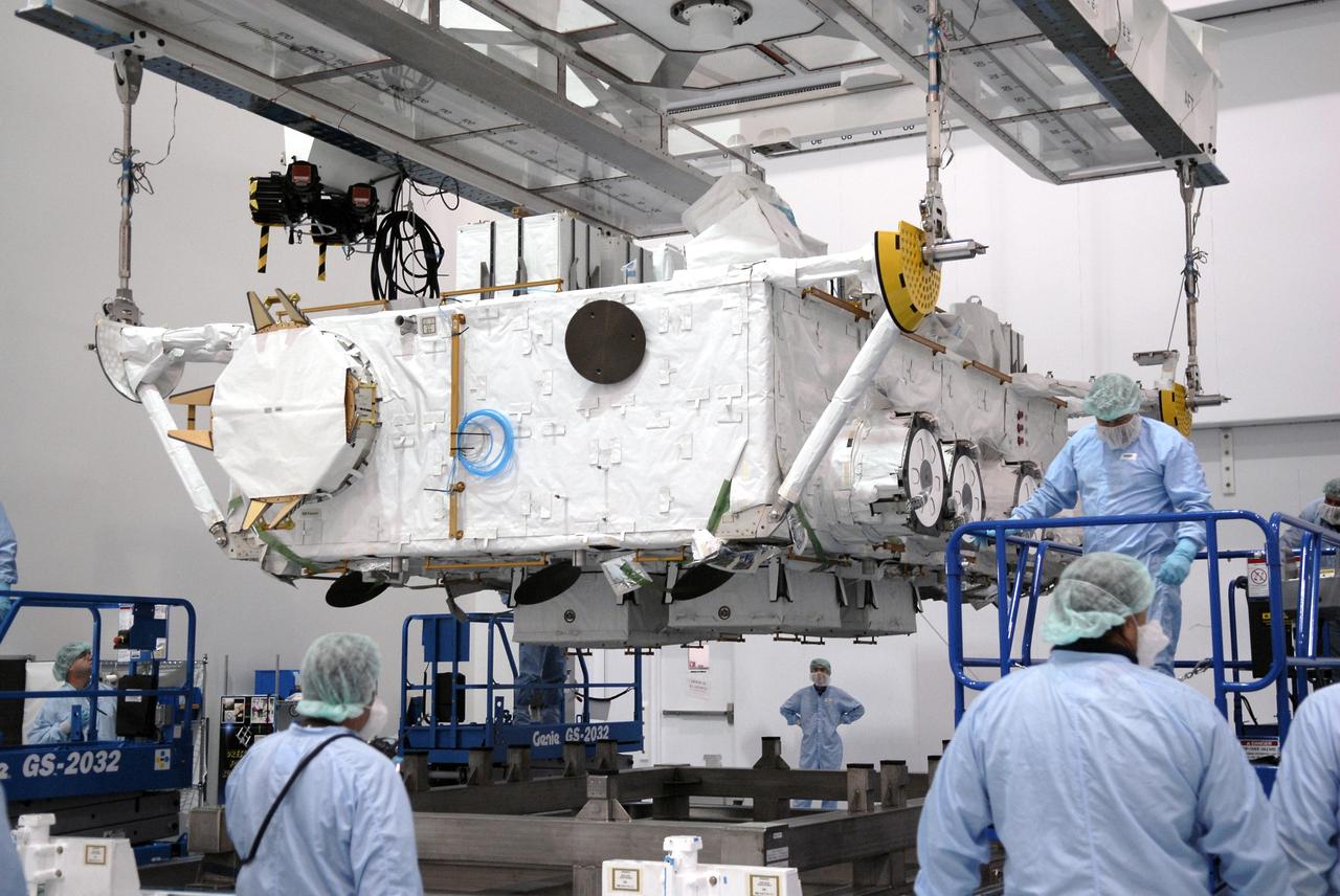 CAPE CANAVERAL, Fla. – In the Space Station Processing Facility at NASA's Kennedy Space Center in Florida, the Japan Aerospace Exploration Agency's Kibo Exposed Facility, or EF, is lifted for a move to another stand. The EF, along with the Experiment Logistics Module Exposed Section, will be carried aboard space shuttle Endeavour on the STS-127 mission to the International Space Station targeted for launch May 15, 2009. When it is installed on the Kibo laboratory,the EF will provide a multipurpose platform where science experiments can be deployed and operated in the exposed environment. The payloads attached to the EF can be exchanged or retrieved by Kibo's robotic arm, the JEM Remote Manipulator System. Photo credit: NASA/Kim Shiflett