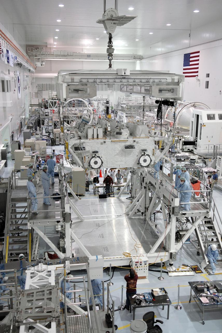 CAPE CANAVERAL, Fla. – In the Space Station Processing Facility at NASA's Kennedy Space Center in Florida, the Japan Aerospace Exploration Agency's Kibo Exposed Facility, or EF, is moved across the room to another stand. The EF, along with the Experiment Logistics Module Exposed Section, will be carried aboard space shuttle Endeavour on the STS-127 mission to the International Space Station targeted for launch May 15, 2009. When it is installed on the Kibo laboratory,the EF will provide a multipurpose platform where science experiments can be deployed and operated in the exposed environment. The payloads attached to the EF can be exchanged or retrieved by Kibo's robotic arm, the JEM Remote Manipulator System. Photo credit: NASA/Kim Shiflett