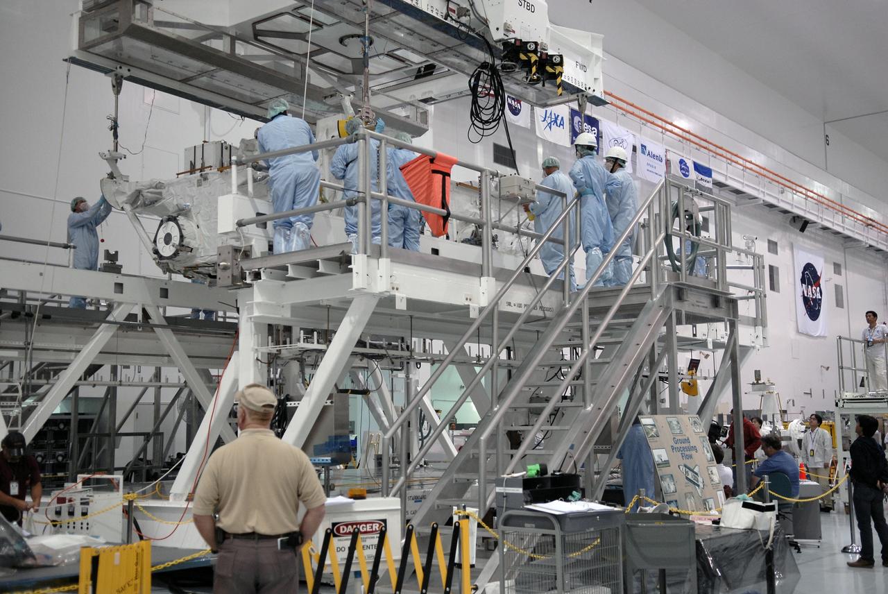CAPE CANAVERAL, Fla. – In the Space Station Processing Facility at NASA's Kennedy Space Center in Florida, the Japan Aerospace Exploration Agency's Kibo Exposed Facility, or EF, is moved across the room to another stand. The EF, along with the Experiment Logistics Module Exposed Section, will be carried aboard space shuttle Endeavour on the STS-127 mission to the International Space Station targeted for launch May 15, 2009. When it is installed on the Kibo laboratory,the EF will provide a multipurpose platform where science experiments can be deployed and operated in the exposed environment. The payloads attached to the EF can be exchanged or retrieved by Kibo's robotic arm, the JEM Remote Manipulator System. Photo credit: NASA/Kim Shiflett