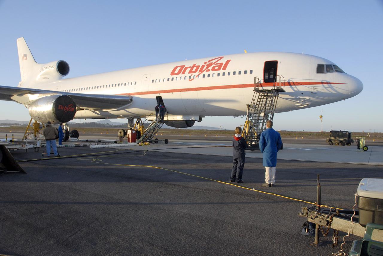 VANDENBERG AIR FORCE BASE, Fla. -- On the ramp on Vandenberg Air Force Base in California, the Orbital Sciences’ L-1011 aircraft is being prepared to receive the Pegasus XL rocket and NASA’s Interstellar Boundary Explorer, or IBEX, spacecraft. IBEX is targeted for launch from the Kwajalein Atoll, a part of the Marshall Islands in the Pacific Ocean, on Oct. 19. IBEX will be launched aboard the Pegasus rocket dropped from under the wing of the L-1011 aircraft flying over the Pacific Ocean. The Pegasus will carry the spacecraft approximately 130 miles above Earth and place it in orbit. The IBEX satellite will make the first map of the boundary between the Solar System and interstellar space. Photo credit: NASA/Mark Mackley, VAFB