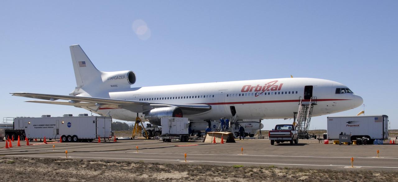 VANDENBERG AIR FORCE BASE, Fla. -- NASA’s Interstellar Boundary Explorer, or IBEX, spacecraft and mated Pegasus XL rocket are being attached to Orbital Sciences’ L-1011 aircraft for launch. IBEX is targeted for launch from the Kwajalein Atoll, a part of the Marshall Islands in the Pacific Ocean, on Oct.  19.  IBEX will be launched aboard the Pegasus rocket dropped from under the wing of the L-1011 aircraft flying over the Pacific Ocean. The Pegasus will carry the spacecraft approximately 130 miles above Earth and place it in orbit. The IBEX satellite will make the first map of the boundary between the Solar System and interstellar space. Photo credit: NASA/Mark Mackley, VAFB