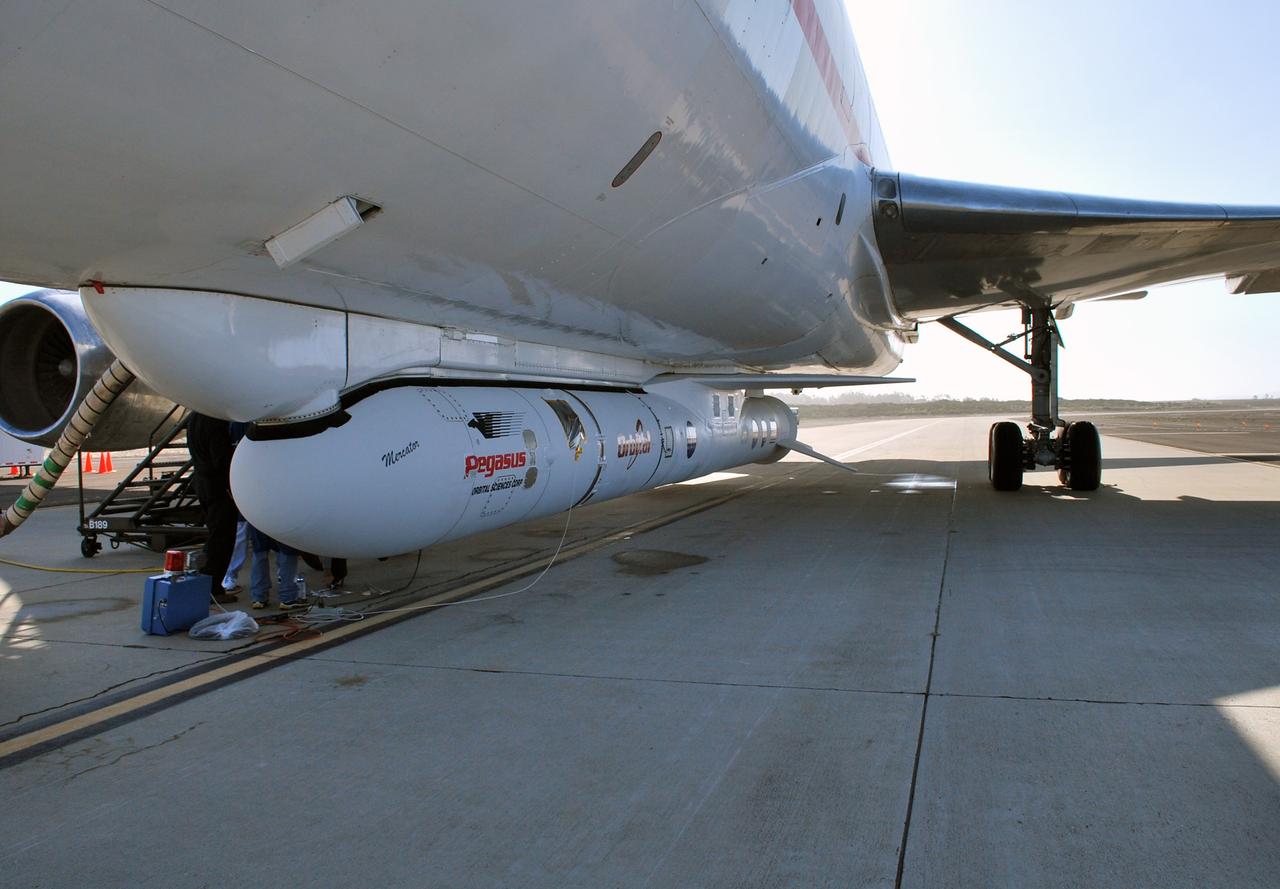 VANDENBERG AIR FORCE BASE, Calif. – On the ramp of Vandenberg Air Force Base in California, Orbital Sciences’ L-1011 aircraft awaits departure for the Kwajalein Atoll, a part of the Marshall Islands in the Pacific Ocean, with NASA’s Interstellar Boundary Explorer, or IBEX, spacecraft and Pegasus XL rocket. The Pegasus is attached under the wing of the aircraft for launch.  Departing from Kwajalein, the Pegasus rocket will be dropped from under the wing of the L-1011 over the Pacific Ocean to carry the spacecraft approximately 130 miles above Earth and place it in orbit.  Then, the spacecraft’s own engine will boost it to its final high-altitude orbit (about 200,000 miles high) — most of the way to the Moon. The IBEX satellite will make the first map of the boundary between the Solar System and interstellar space.  IBEX science will be led by the Southwest Research Institute of San Antonio, Texas.  IBEX is targeted for launch over the Pacific Oct. 19.   Photo credit: NASA/Randy Beaudoin, VAFB