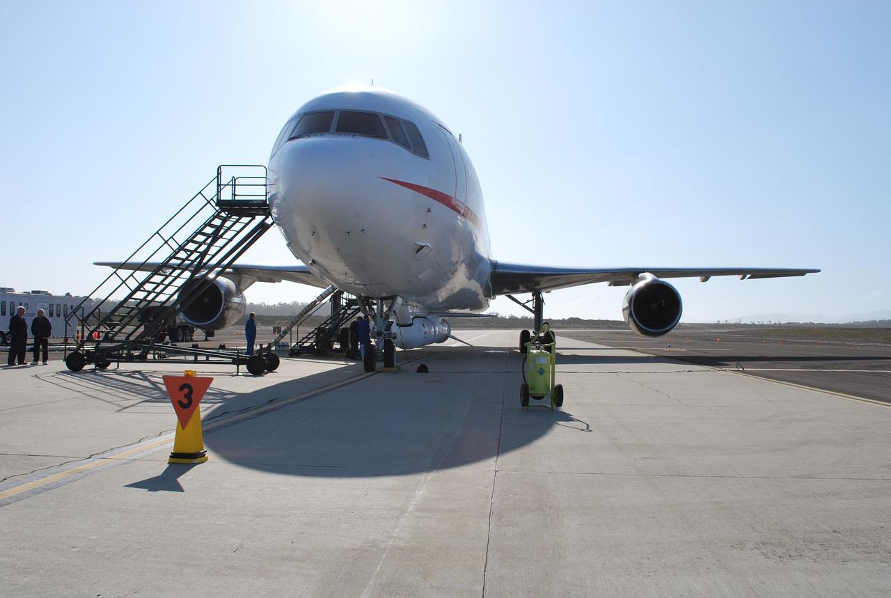 VANDENBERG AIR FORCE BASE, Calif. – On the ramp of Vandenberg Air Force Base in California, Orbital Sciences’ L-1011 aircraft awaits departure for the Kwajalein Atoll, a part of the Marshall Islands in the Pacific Ocean, with NASA’s Interstellar Boundary Explorer, or IBEX, spacecraft and Pegasus XL rocket. The Pegasus is attached under the wing of the aircraft for launch.   Departing from Kwajalein, the Pegasus rocket will be dropped from under the wing of the L-1011 over the Pacific Ocean to carry the spacecraft approximately 130 miles above Earth and place it in orbit.  Then, the spacecraft’s own engine will boost it to its final high-altitude orbit (about 200,000 miles high) — most of the way to the Moon. The IBEX satellite will make the first map of the boundary between the Solar System and interstellar space.  IBEX science will be led by the Southwest Research Institute of San Antonio, Texas.  IBEX is targeted for launch over the Pacific Oct. 19.   Photo credit: NASA/Randy Beaudoin, VAFB