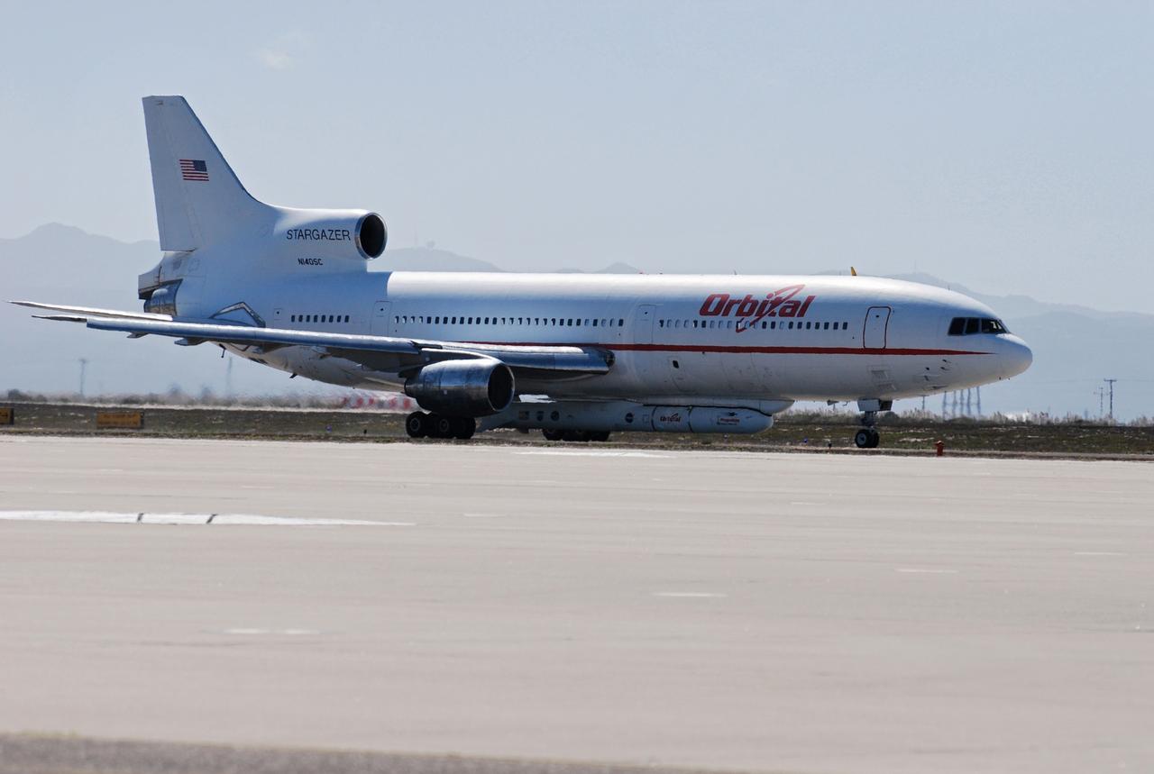 VANDENBERG AIR FORCE BASE, Calif. –  Orbital Sciences’ L-1011 aircraft begins rolling for takeoff from Vandenberg Air Force Base in California to the Kwajalein Atoll, a part of the Marshall Islands in the Pacific Ocean.  Under its wing is NASA’s Interstellar Boundary Explorer, or IBEX, spacecraft and Pegasus XL rocket.  Departing from Kwajalein, the Pegasus rocket will be dropped from under the wing of the L-1011 over the Pacific Ocean to carry the spacecraft approximately 130 miles above Earth and place it in orbit.  Then, the spacecraft’s own engine will boost it to its final high-altitude orbit (about 200,000 miles high) — most of the way to the Moon. The IBEX satellite will make the first map of the boundary between the Solar System and interstellar space.  IBEX science will be led by the Southwest Research Institute of San Antonio, Texas.  IBEX is targeted for launch over the Pacific Oct. 19.   Photo credit: NASA/Randy Beaudoin, VAFB