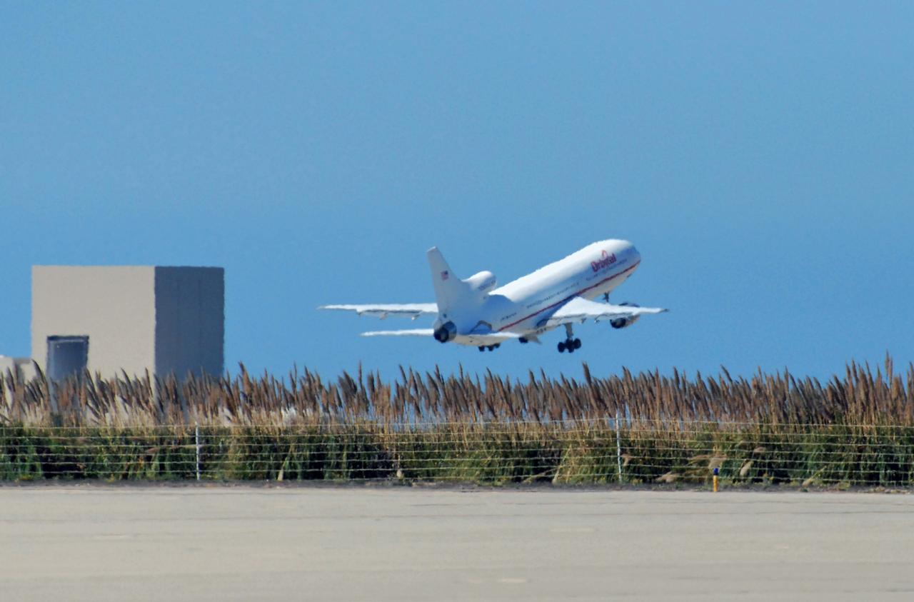 VANDENBERG AIR FORCE BASE, Calif. –  Orbital Sciences’ L-1011 aircraft takes off from Vandenberg Air Force Base in California for the Kwajalein Atoll, a part of the Marshall Islands in the Pacific Ocean.  Under its wing is NASA’s Interstellar Boundary Explorer, or IBEX, spacecraft and Pegasus XL rocket. Departing from Kwajalein, the Pegasus rocket will be dropped from under the wing of the L-1011 over the Pacific Ocean to carry the spacecraft approximately 130 miles above Earth and place it in orbit.  Then, the spacecraft’s own engine will boost it to its final high-altitude orbit (about 200,000 miles high) — most of the way to the Moon. The IBEX satellite will make the first map of the boundary between the Solar System and interstellar space.  IBEX science will be led by the Southwest Research Institute of San Antonio, Texas.  IBEX is targeted for launch over the Pacific Oct. 19.   Photo credit: NASA/Randy Beaudoin, VAFB