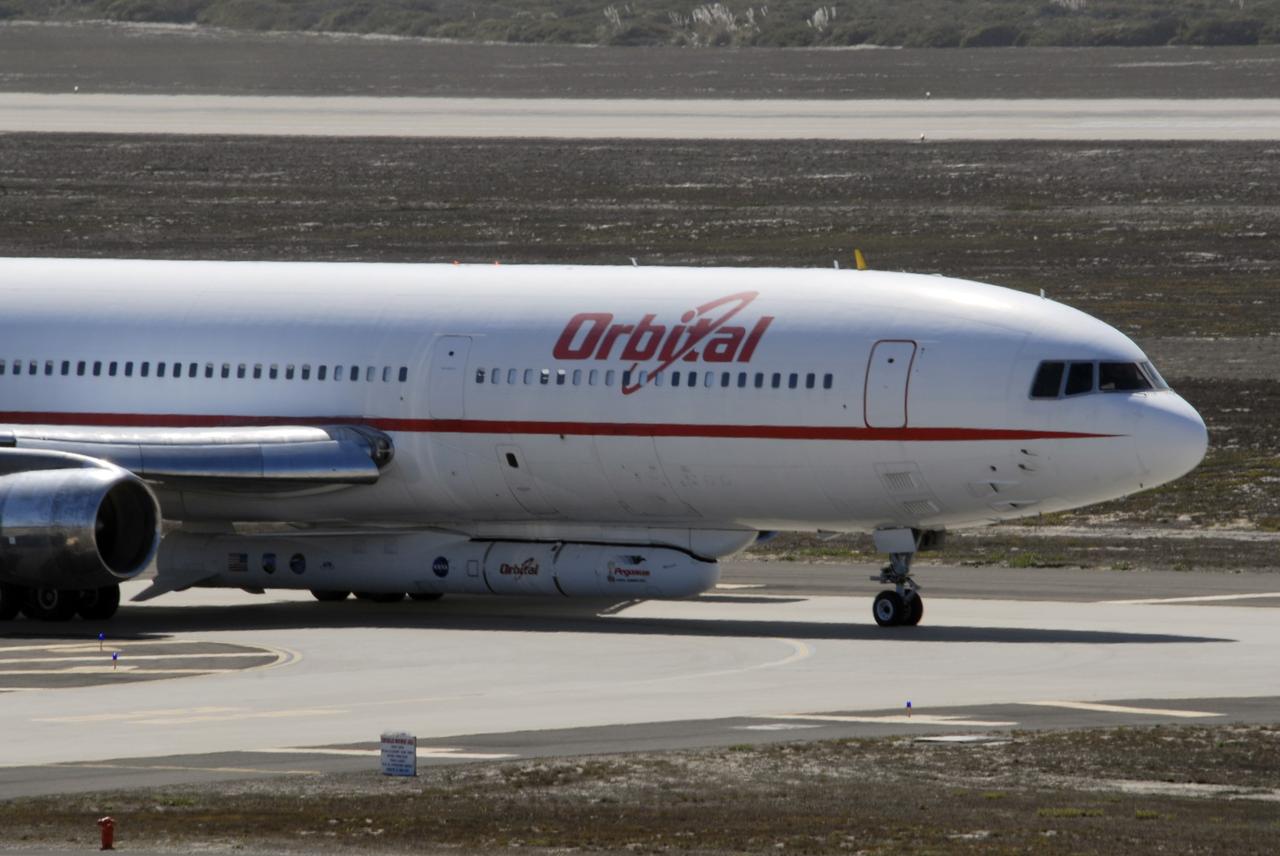 VANDENBERG AIR FORCE BASE, Calif. –  Orbital Sciences’ L-1011 aircraft begins to taxi for takeoff from Vandenberg Air Force Base in California to the Kwajalein Atoll, a part of the Marshall Islands in the Pacific Ocean.  Under its wing is NASA’s Interstellar Boundary Explorer, or IBEX, spacecraft and Pegasus XL rocket.  Departing from Kwajalein, the Pegasus rocket will be dropped from under the wing of the L-1011 over the Pacific Ocean to carry the spacecraft approximately 130 miles above Earth and place it in orbit.  Then, the spacecraft’s own engine will boost it to its final high-altitude orbit (about 200,000 miles high) — most of the way to the Moon. The IBEX satellite will make the first map of the boundary between the Solar System and interstellar space.  IBEX science will be led by the Southwest Research Institute of San Antonio, Texas.  IBEX is targeted for launch over the Pacific Oct. 19.   Photo credit: NASA/CIV USAF/Daniel Liberotti