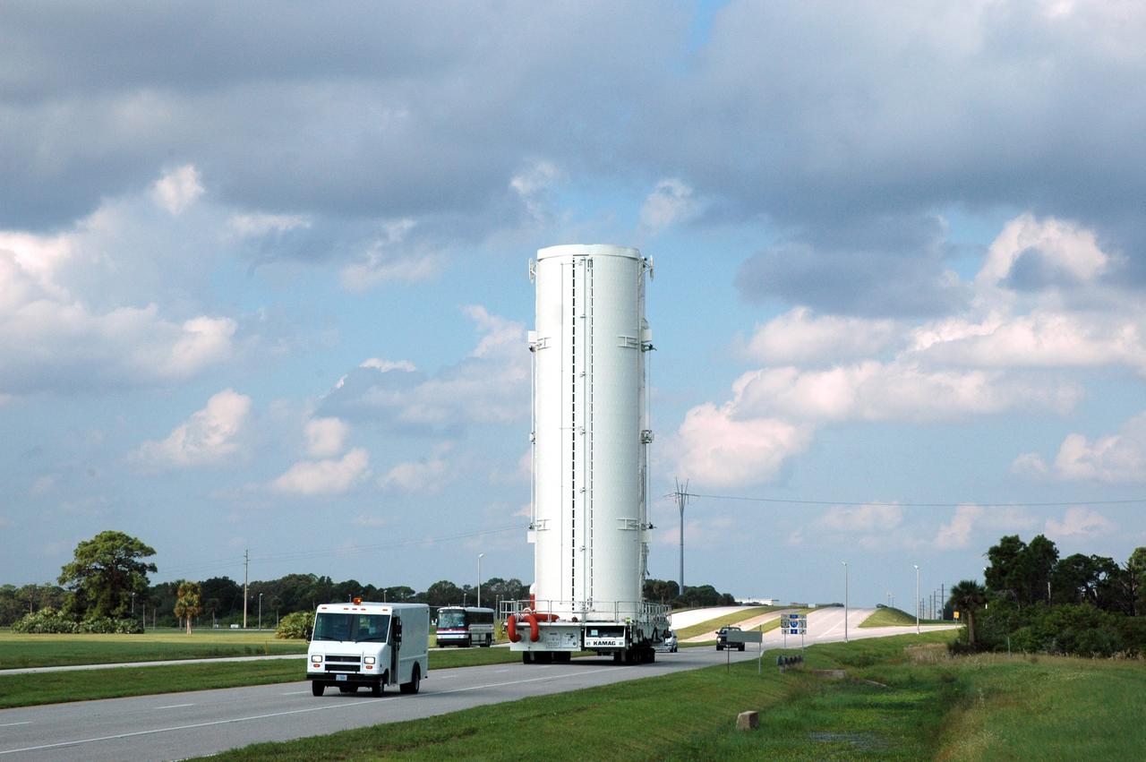CAPE CANAVERAL, Fla. – On NASA's Kennedy Space Center in Florida, the canister with space shuttle Atlantis’ Hubble Space Telescope payload inside makes its way to the Canister Rotation Facility. The payload comprises four carriers holding various equipment for the mission. After rotation to horizontal, the canister will be transported back to Kennedy’s Payload Hazardous Servicing Facility where the hardware will be stored until a new target launch date can be set for Atlantis’ STS-125 mission in 2009. Atlantis’ October target launch date was delayed after a device on board Hubble used in the storage and transmission of science data to Earth shut down on Sept. 27. Replacing the broken device will be added to Atlantis’ servicing mission to the telescope Photo credit: NASA/Tim Jacobs