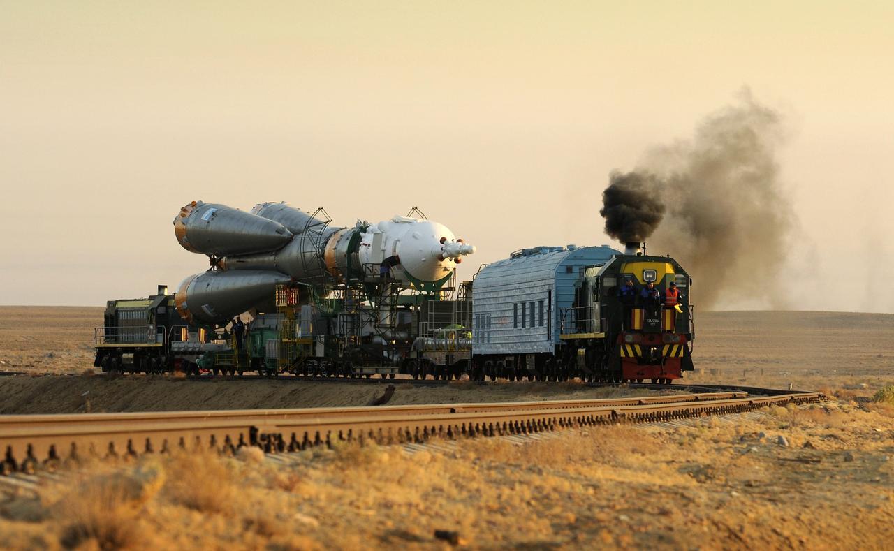 KAZAKHSTAN – The Soyuz TMA-13 spacecraft is transported by railcar to its launch pad at the Baikonur Cosmodrome in Kazakhstan on Oct. 10 for launch Oct. 12 to carry Expedition 18 Commander Michael Fincke, Flight Engineer Yury V. Lonchakov and American Spaceflight Participant Richard Garriott to the International Space Station.  The three crew members will dock their Soyuz to the space station on Oct. 14.  Fincke and Lonchakov will spend six months on the station, while Garriott will return to Earth Oct. 24 with two of the Expedition 17 crew members currently on the space station.  Photo credit: NASA/Bill Ingalls