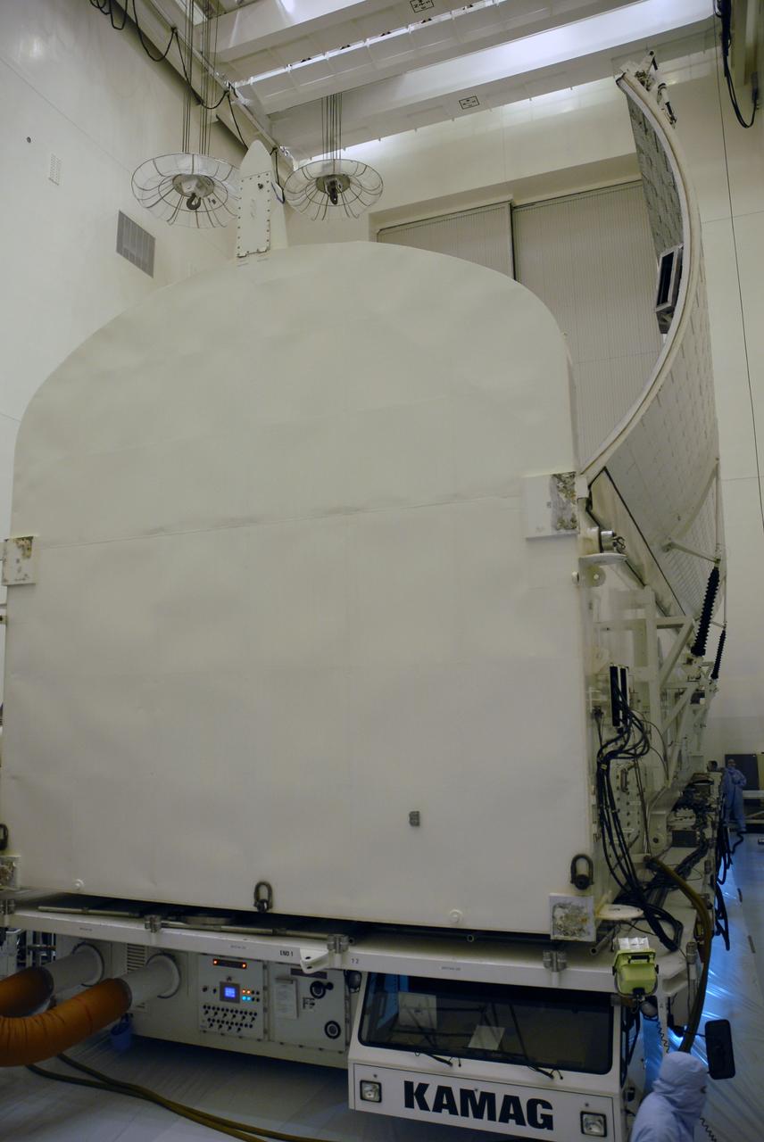 CAPE CANAVERAL, Fla. –  At NASA's Kennedy Space Center in Florida, the doors of the payload canister are opened inside a clean room of the Payload Hazardous Servicing Facility, or PHSF.  The canister contains the Hubble Space Telescope equipment. The payload comprises four carriers holding various equipment for the mission. The canister maintains a controlled environment.  In the PHSF, the carriers will be stored until a new target launch date can be set for Atlantis’ STS-125 mission in 2009. Atlantis’ October target launch date was delayed after a device on board Hubble used in the storage and transmission of science data to Earth shut down on Sept. 27. Replacing the broken device will be added to Atlantis’ servicing mission to the telescope. Photo credit: NASA/Troy Cryder