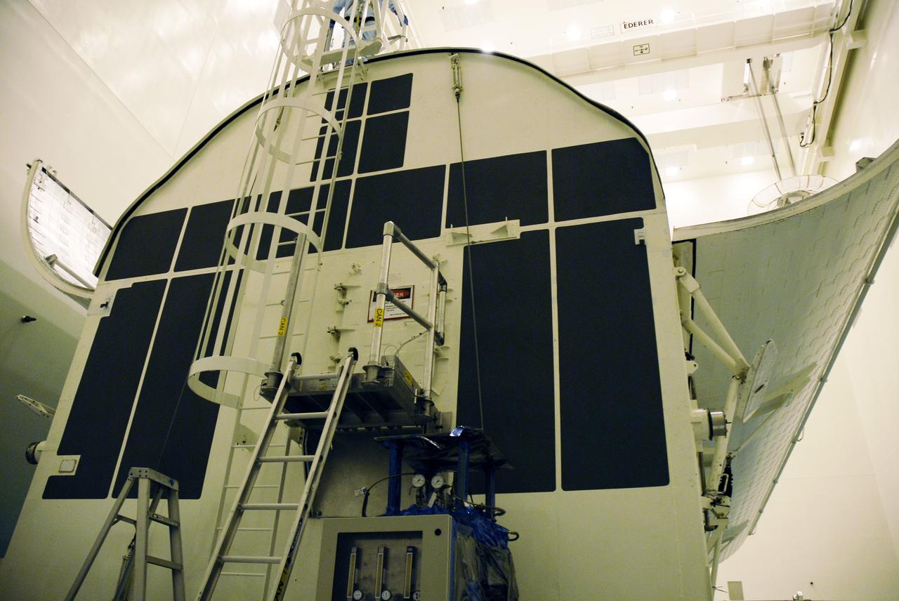 CAPE CANAVERAL, Fla. –  At NASA's Kennedy Space Center in Florida, the doors of the payload canister are opened inside a clean room of the Payload Hazardous Servicing Facility, or PHSF.  The canister contains the Hubble Space Telescope equipment.  The payload comprises four carriers holding various equipment for the mission. The canister maintains a controlled environment.  In the PHSF, the carriers will be stored until a new target launch date can be set for Atlantis’ STS-125 mission in 2009. Atlantis’ October target launch date was delayed after a device on board Hubble used in the storage and transmission of science data to Earth shut down on Sept. 27. Replacing the broken device will be added to Atlantis’ servicing mission to the telescope. Photo credit: NASA/Troy Cryder