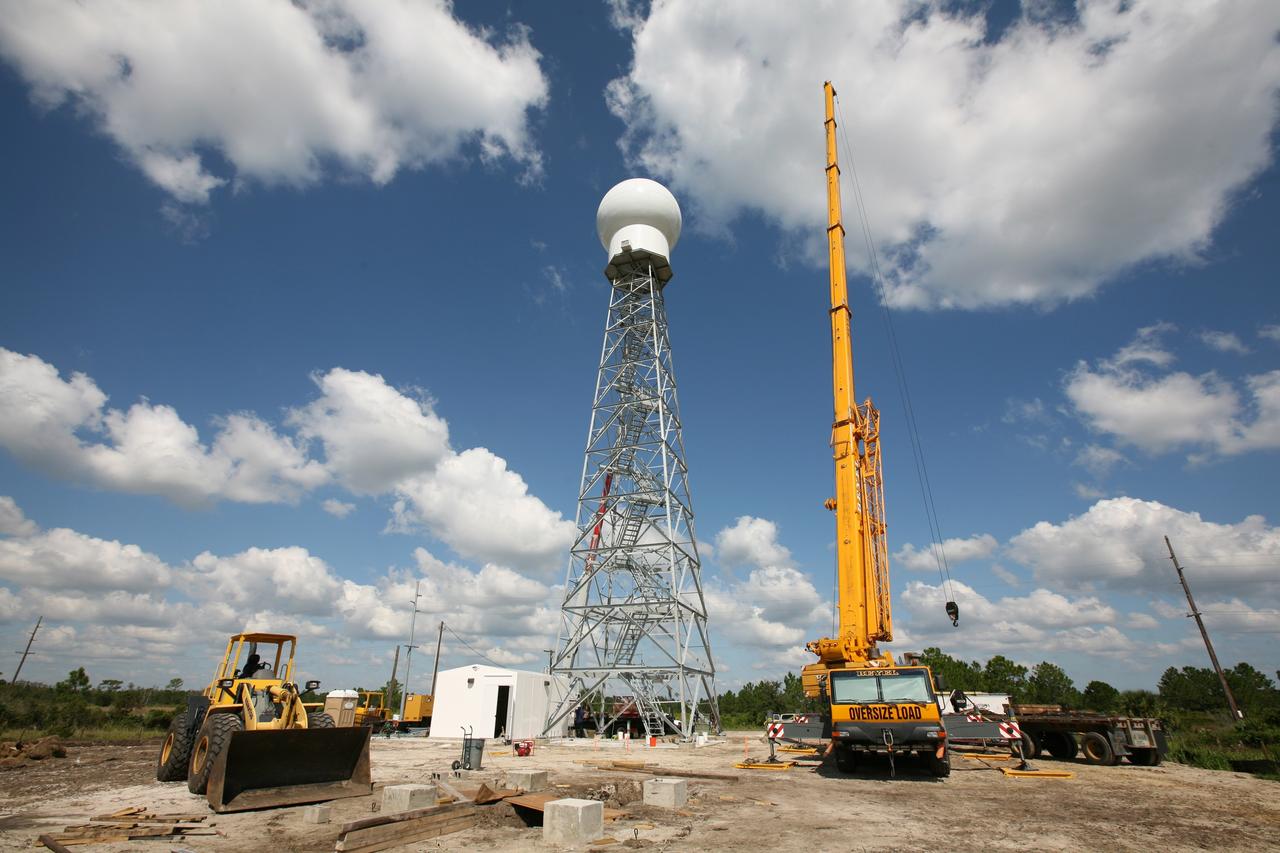 CAPE CANAVERAL, Fla. - The radome is secured atop a new Doppler weather radar tower being built in an area near S.R. 520 in Orange County, Fla. The dome houses the weather radar dish and pedestal and protects them from the elements. The new tower will replace one at nearby Patrick Air Force Base and will be used by NASA's Kennedy Space Center, the 45th Space Wing and their customers. The tower will be able to monitor weather conditions directly above the launch pads at Kennedy. The weather radar is essential in issuing lightning and other severe weather warnings and vital in evaluating lightning launch commit criteria. The new radar, replacing what was installed 25 years ago, includes Doppler capability to detect winds and identify the type, size and number of precipitation particles. The site is ideally distant from the launch pads and has unobstructed views of Cape Canaveral Air Force Station and Kennedy. Photo credit: NASA/Dimitri Gerondidakis