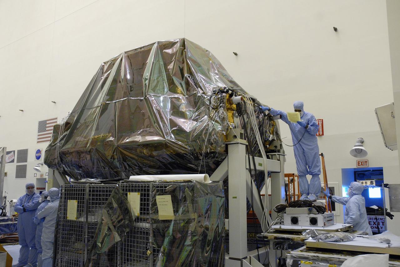 CAPE CANAVERAL, Fla. - In the Payload Hazardous Servicing Facility, or PHSF, at NASA's Kennedy Space Center in Florida, the Super Lightweight Interchangeable Carrier, or SLIC, is placed on a work platform after its return to the clean room from Launch Pad 39A.  The payload for Hubble servicing mission 4 comprises four carriers holding various equipment for the mission. In the PHSF, the carriers will be stored until a new target launch date in 2009 can be set for Atlantis’ STS-125 mission. Atlantis’ October target launch date was delayed after a device on board Hubble, used in the storage and transmission of science data to Earth, shut down on Sept. 27. Replacing the broken device will be added to Atlantis’ servicing mission to the telescope.  Photo credit: NASA/Jim Grossmann