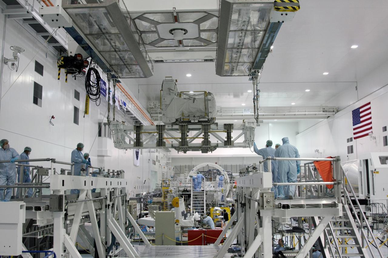 CAPE CANAVERAL, Fla. - The Lightweight Multi-Purpose Experiment Support Structure Carrier with the flexible hose rotary coupler is moved across the Space Station Processing Facility at NASA's Kennedy Space Center in Florida. It will be installed in the payload canister. The carrier is part of space shuttle Endeavour's payload on the STS-126 mission to the International Space Station. Endeavour will also carry the Multi-Purpose Logistics Module Leonardo holding supplies and equipment, including additional crew quarters, equipment for the regenerative life support system and spare hardware. Endeavour is targeted for launch on Nov. 14. Photo credit: NASA/Dimitri Gerondidakis