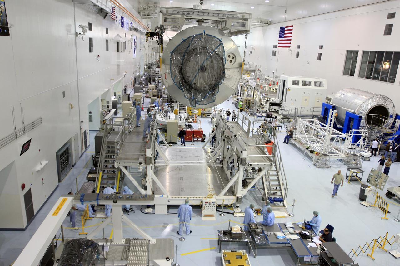 CAPE CANAVERAL, Fla. - The Multi-Purpose Logistics Module Leonardo is moved across the Space Station Processing Facility at NASA's Kennedy Space Center in Florida. Leonardo is part of space shuttle Endeavour's payload on the STS-126 mission to the International Space Station. The module will be installed in the waiting payload canister for transfer to Launch Pad 39A. At the pad, the payload canister will release its cargo into the Payload Changeout Room. Later, the payload will be installed in space shuttle Endeavour's payload bay. The module contains supplies and equipment, including additional crew quarters, equipment for the regenerative life support system and spare hardware. Endeavour is targeted for launch on Nov. 14. Photo credit: NASA/Troy Cryder