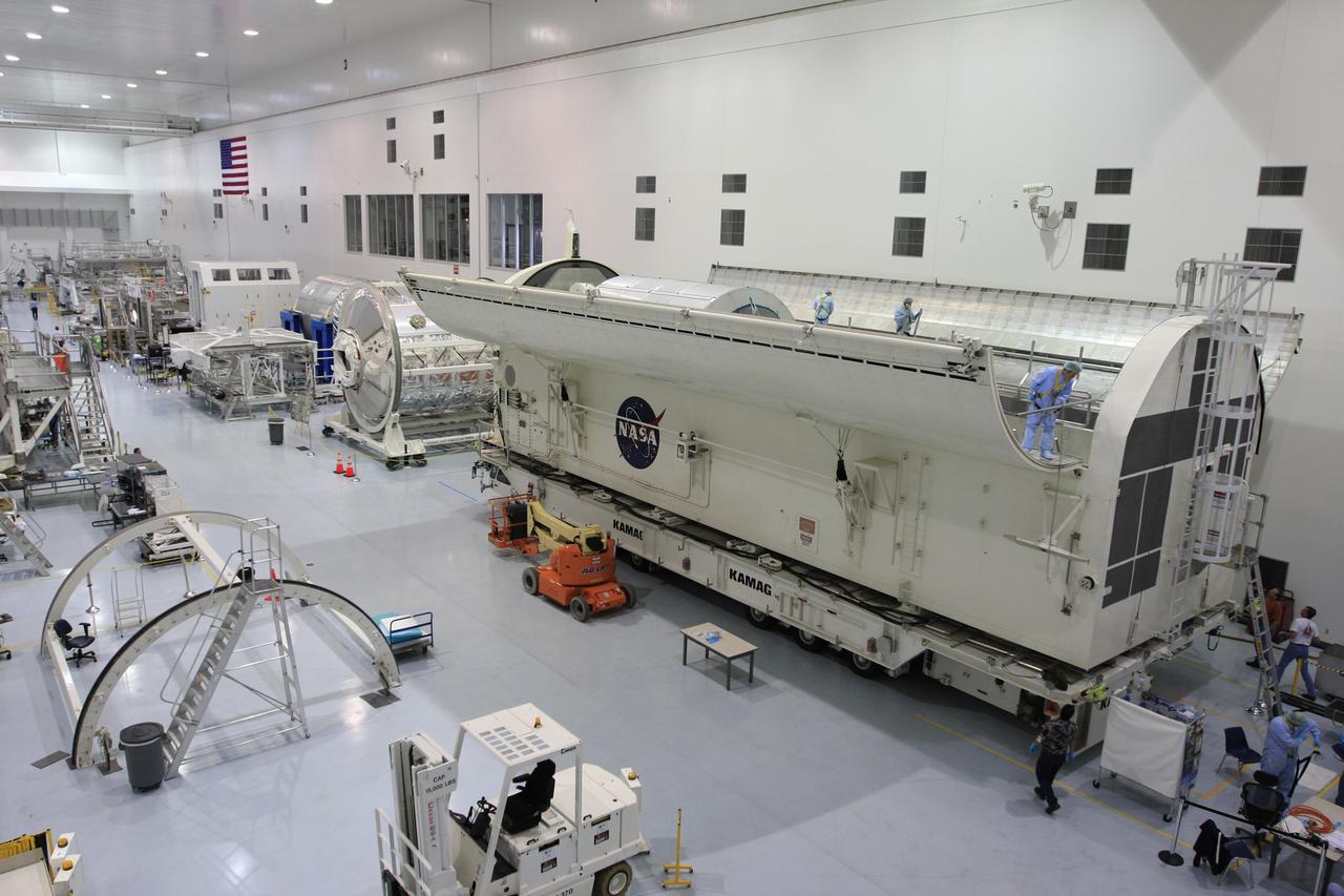CAPE CANAVERAL, Fla. -  In the Space Station Processing Facility at NASA's Kennedy Space Center in Florida, workers prepare to close the payload canister containing the payload for space shuttle Endeavour's STS-126 mission.  Inside the canister are the Multi-Purpose Logistics Module Leonardo and the Lightweight Multi-Purpose Experiment Support Structure Carrier.  The canister next will be transported to the Canister Rotation Facility to raise it to vertical and then will be taken to Launch Pad 39A. At the pad, the payload canister will release its cargo into the Payload Changeout Room.  Later, the payload will be installed in Endeavour's payload bay.  Endeavour is targeted for launch on Nov. 14.  Photo credit: NASA/Troy Cryder