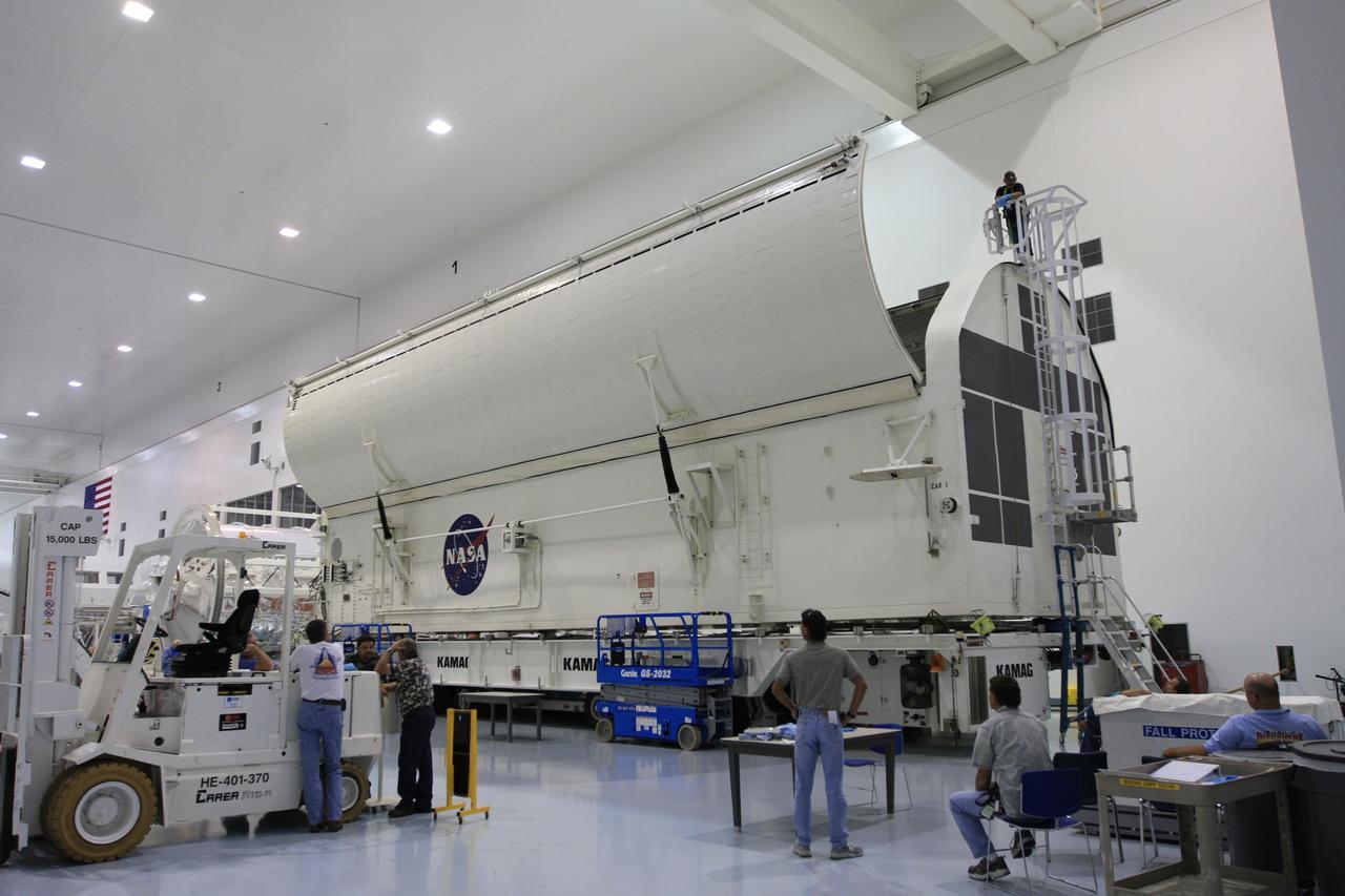 CAPE CANAVERAL, Fla. -  In the Space Station Processing Facility at NASA's Kennedy Space Center in Florida, the doors of the payload canister are closing over the payload for space shuttle Endeavour's STS-126 mission.  Inside the canister are the Multi-Purpose Logistics Module Leonardo and the Lightweight Multi-Purpose Experiment Support Structure Carrier.  The canister next will be transported to the Canister Rotation Facility to raise it to vertical and then will be taken to Launch Pad 39A. At the pad, the payload canister will release its cargo into the Payload Changeout Room.  Later, the payload will be installed in Endeavour's payload bay.  Endeavour is targeted for launch on Nov. 14.  Photo credit: NASA/Troy Cryder