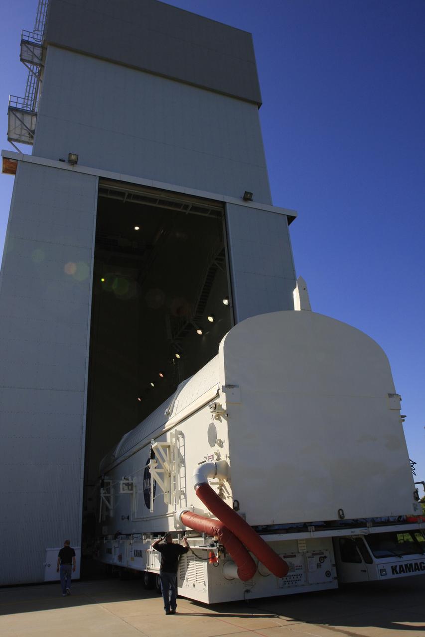CAPE CANAVERAL, Fla. -   The payload canister containing the payload for space shuttle Endeavour's STS-126 mission rolls into the Canister Rotation Facility at NASA's Kennedy Space Center in Florida.  The canister will be  raised to vertical and then transported to Launch Pad 39A.  At the pad, the payload canister will release its cargo into the Payload Changeout Room.  Later, the payload will be installed in Endeavour's payload bay.  Endeavour is targeted for launch on Nov. 14.  Photo credit: NASA/Troy Cryder