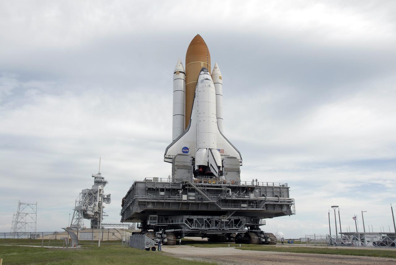 CAPE CANAVERAL, Fla. - At NASA's Kennedy Space Center in Florida, space shuttle Endeavour atop its mobile launcher platform leave Launch Pad 39B behind as it rolls around to Launch Pad 39A. First motion was at 8:28 a.m. EDT. Endeavour is targeted to launch Nov. 14 on the STS-126 mission. On this 27th mission to the International Space Station, Endeavour will carry the Lightweight Multi-Purpose Experiment Support Structure Carrier and the Multi-Purpose Logistics Module Leonardo that will hold supplies and equipment, including additional crew quarters, additional exercise equipment, spare hardware and equipment for the regenerative life support system. Photo credit: NASA/Kim Shiflett