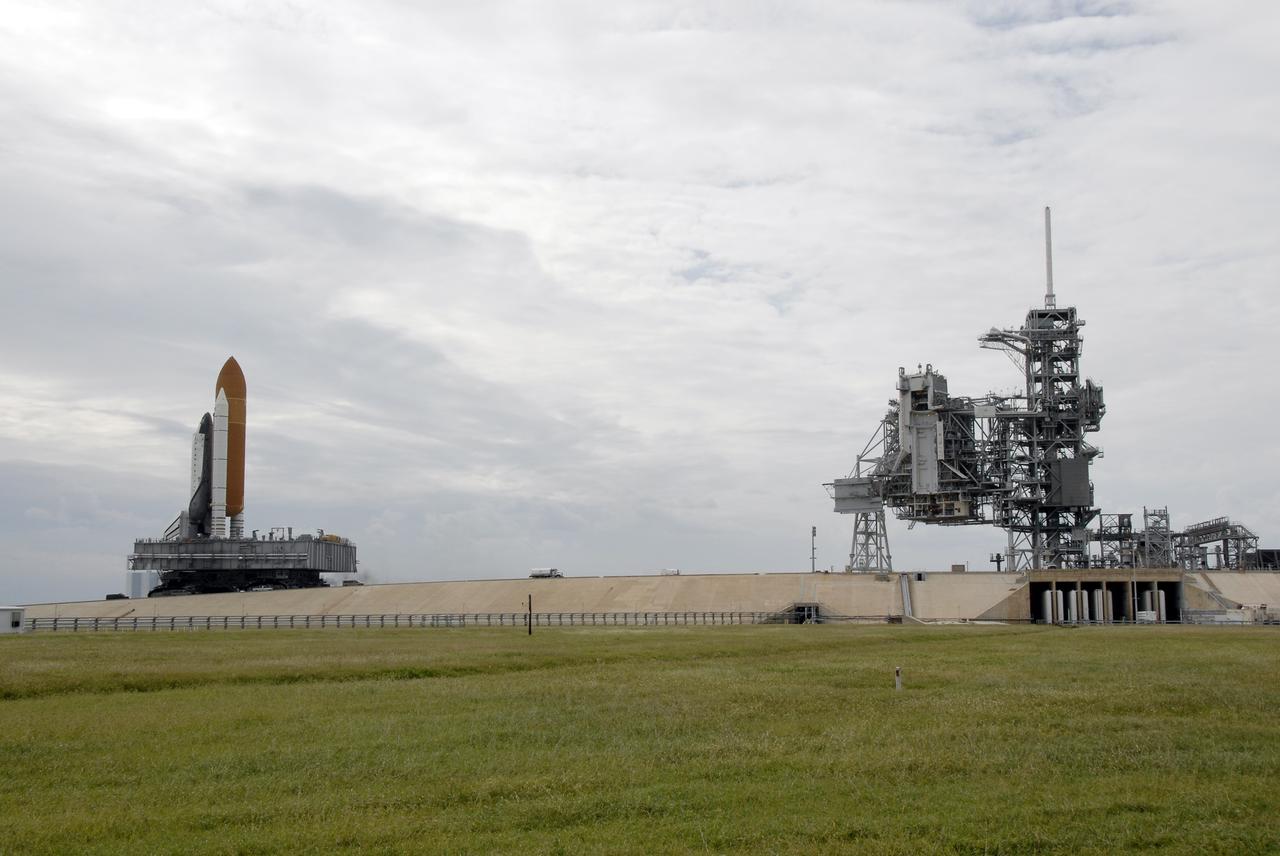 CAPE CANAVERAL, Fla. -  At NASA's Kennedy Space Center in Florida, space shuttle Endeavour rolls up the ramp toward Launch Pad 39A.  The shuttle moved off Launch Pad 39B starting at 8:28 am. EDT and completed its move to Launch Pad 39A at 4:37 p.m. Endeavour is targeted to launch Nov. 14 on the STS-126 mission. On this 27th mission to the International Space Station, Endeavour will carry the Lightweight Multi-Purpose Experiment Support Structure Carrier and the Multi-Purpose Logistics Module Leonardo that will hold supplies and equipment, including additional crew quarters, additional exercise equipment, spare hardware and equipment for the regenerative life support system.  Photo credit: NASA/Kim Shiflett