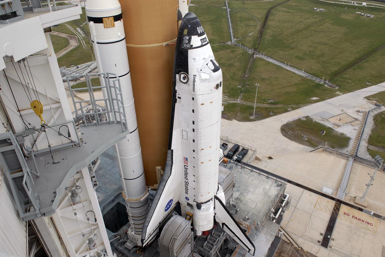 CAPE CANAVERAL, Fla. -  At NASA's Kennedy Space Center in Florida, space shuttle Endeavour comes to rest on Launch Pad 39A  after rolling around from launch Pad 39B.  The shuttle moved off Launch Pad 39B starting at 8:28 am. EDT and completed its move to Launch Pad 39A at 4:37 p.m. Endeavour is targeted to launch Nov. 14 on the STS-126 mission. On this 27th mission to the International Space Station, Endeavour will carry the Lightweight Multi-Purpose Experiment Support Structure Carrier and the Multi-Purpose Logistics Module Leonardo that will hold supplies and equipment, including additional crew quarters, additional exercise equipment, spare hardware and equipment for the regenerative life support system.  Photo credit: NASA/Kim Shiflett